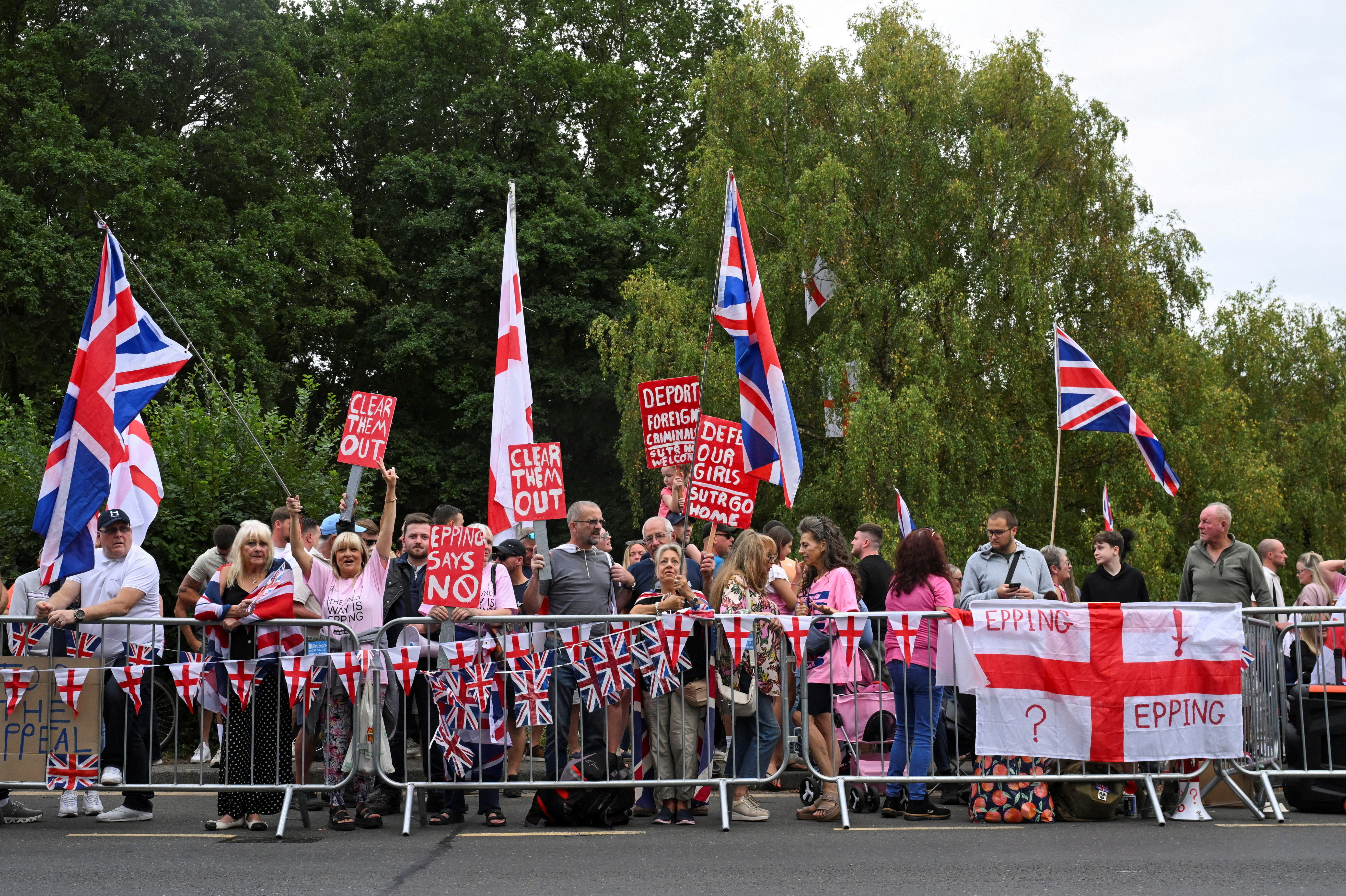 Protesters attend an anti-immigration demonstration, in Epping