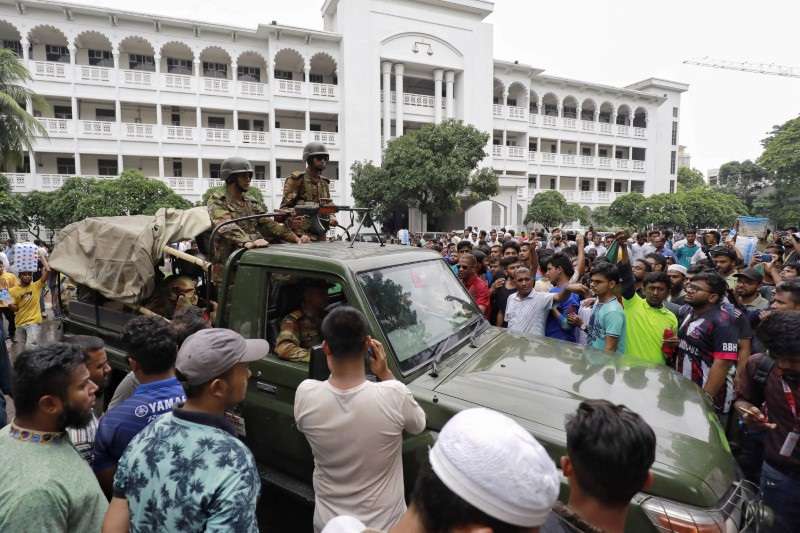 Protesters gather at the High Court premises demanding the resignation of Hassan, chief justice of Bangladesh in Dhaka