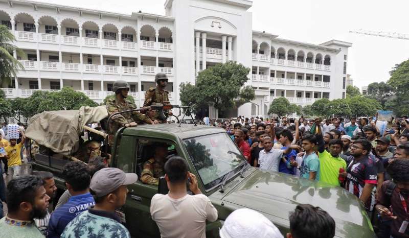 Protesters gather at the High Court premises demanding the resignation of Hassan, chief justice of Bangladesh in Dhaka