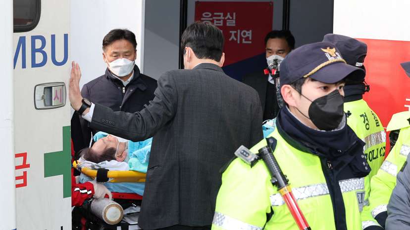 South Korea's opposition Democratic Party leader Lee Jae-myung arrives at Seoul National University Hospital after being stabbed in the neck during his visit to Busan, in Seoul