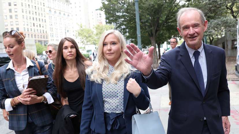 Lawyer David Boies arrives with his client Virginia Giuffre for hearing in the criminal case against Jeffrey Epstein, who died this month in what a New York City medical examiner ruled a suicide, at Federal Court in New York