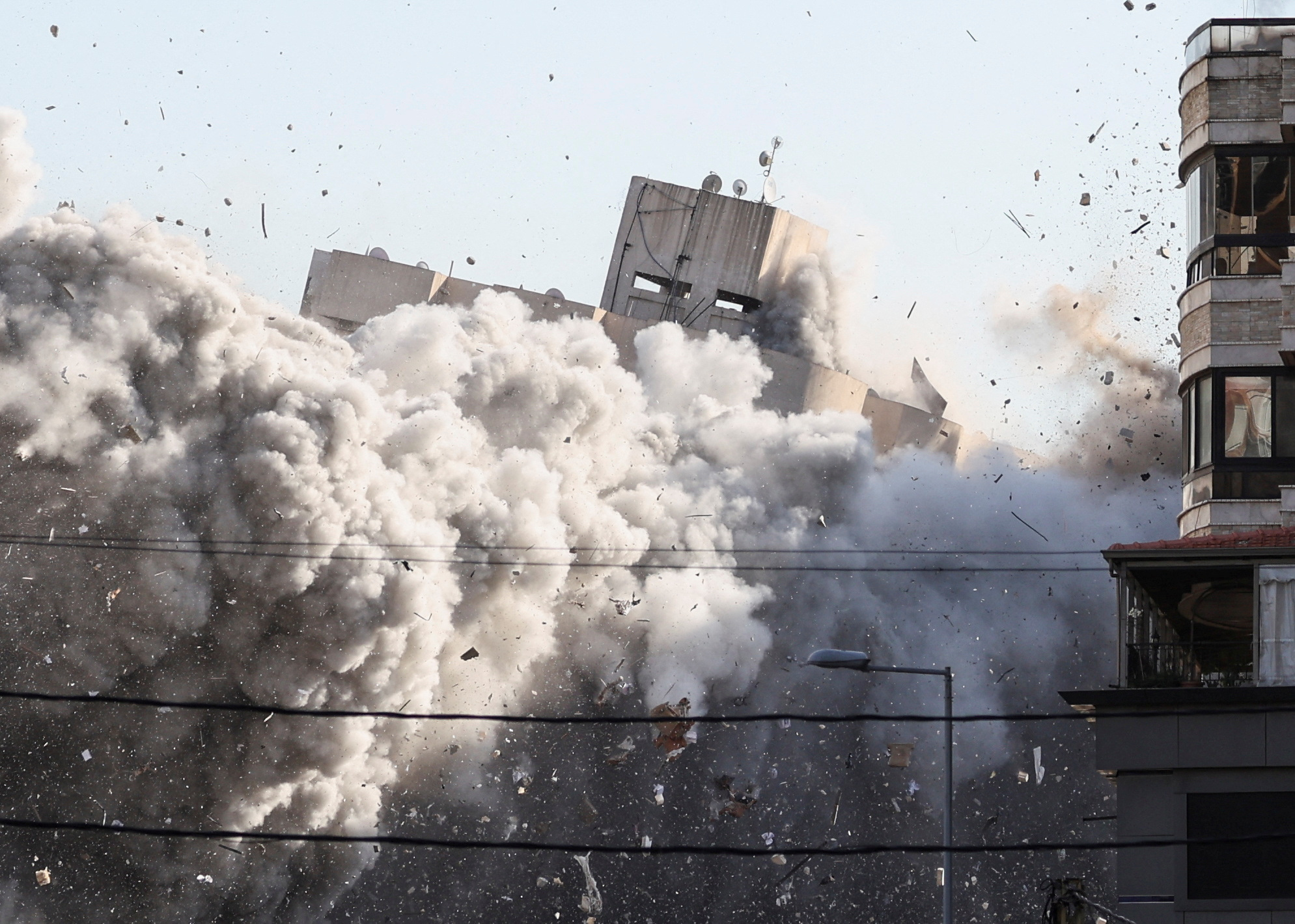 Smoke rises after an Israeli strike on a building in the Chiyah district of Beirut's southern suburbs
