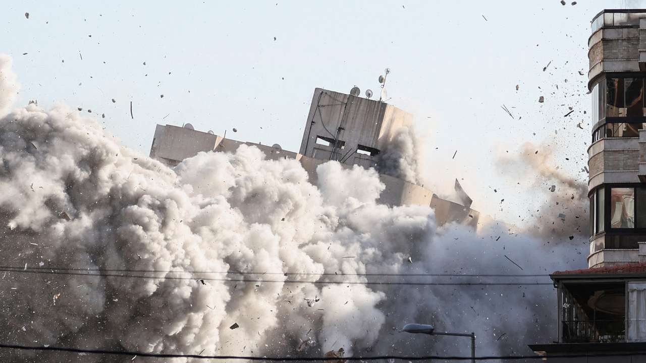 Smoke rises after an Israeli strike on a building in the Chiyah district of Beirut's southern suburbs