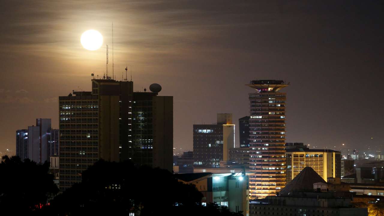 The Pink Supermoon rises over the skyline of Nairobi