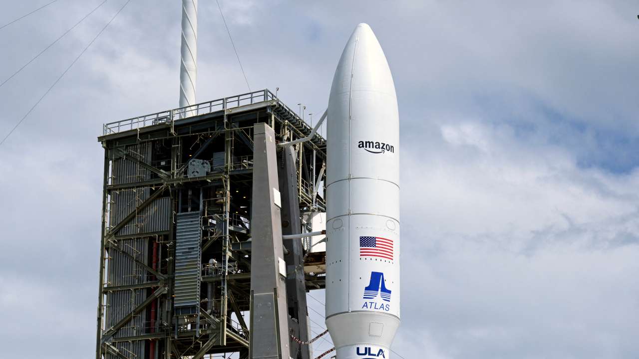 A United Launch Alliance Atlas V rocket is on the launch pad carrying Amazon's Project Kuiper internet network satellites