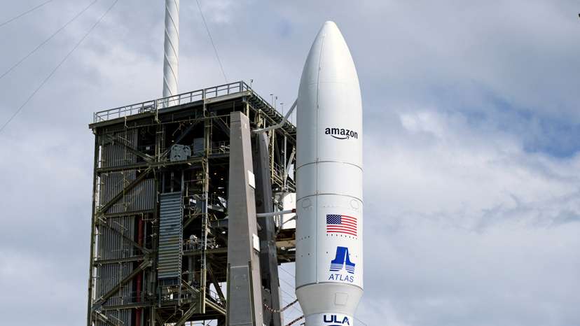 A United Launch Alliance Atlas V rocket is on the launch pad carrying Amazon's Project Kuiper internet network satellites