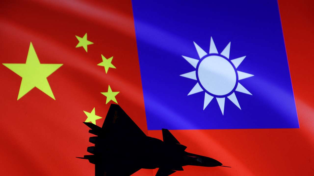 Illustration shows airplane, Chinese and Taiwanese flags