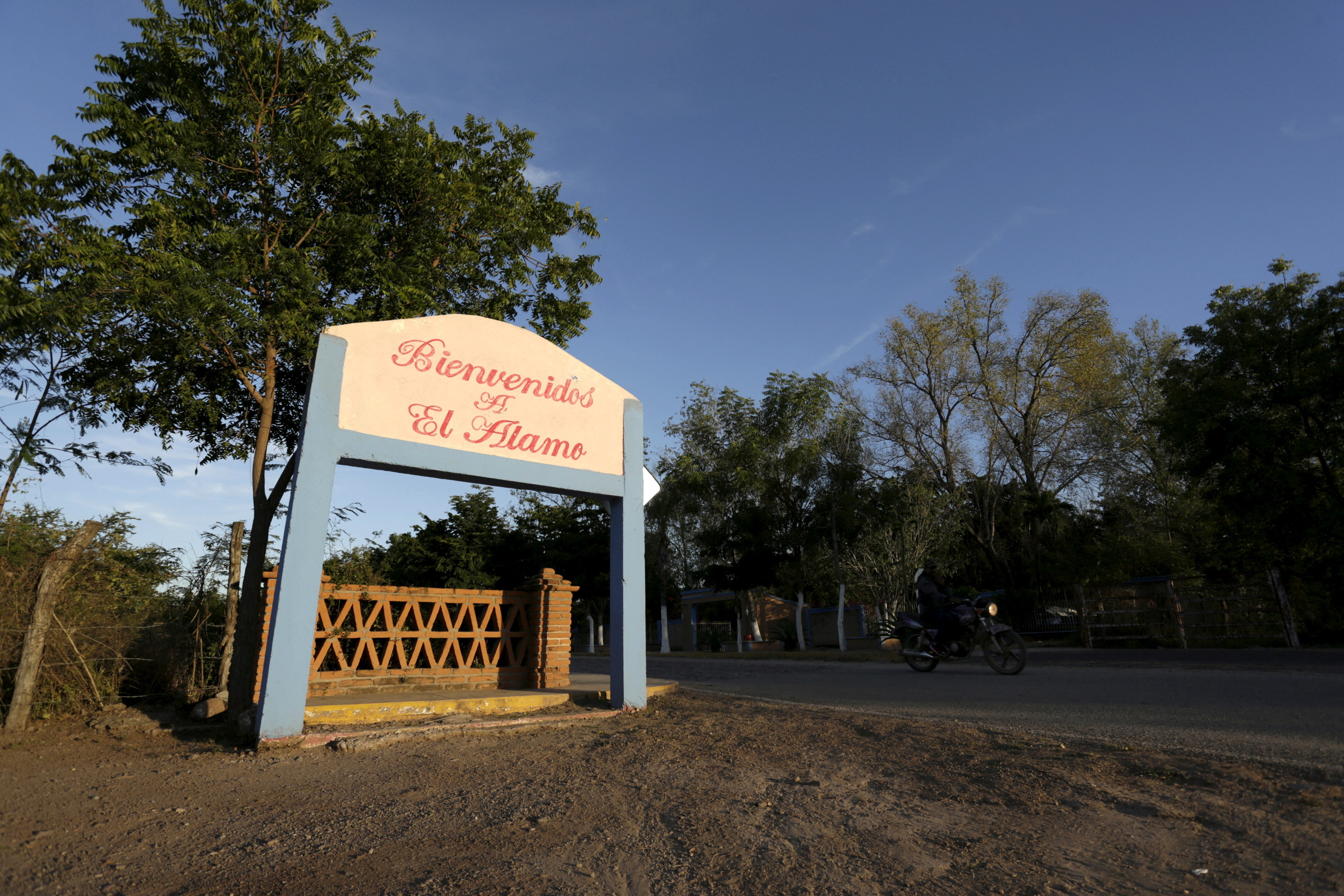FILE PHOTO: A sign bids welcome to visitors to the village where Ismael "El Mayo" Zambada was born in El Alamo