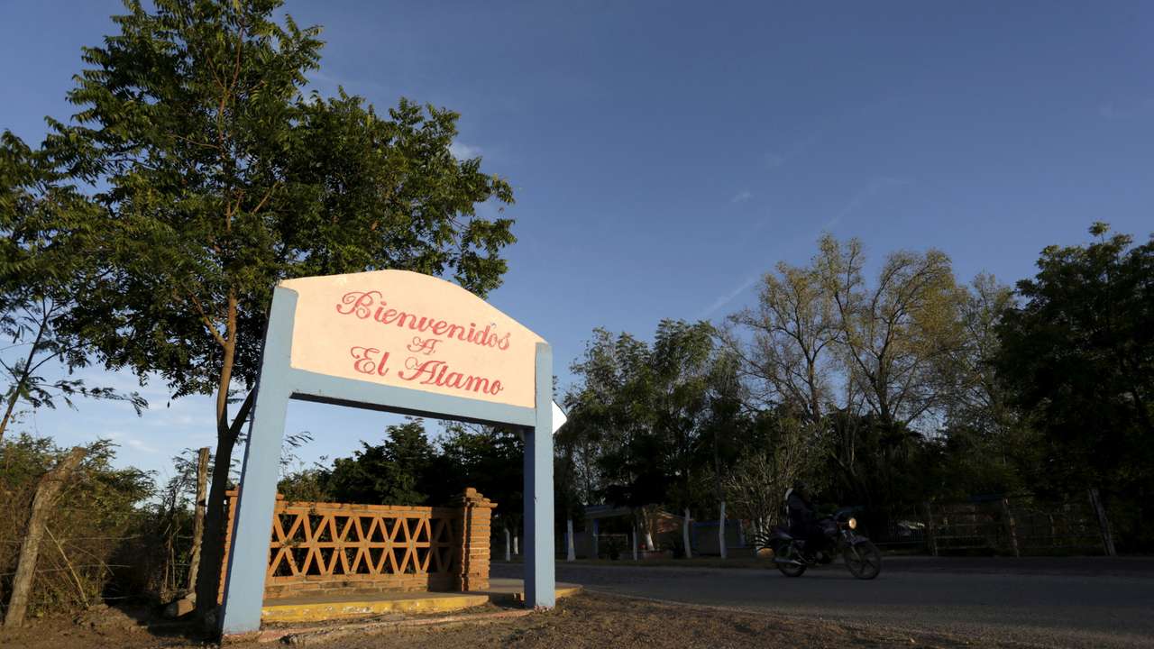 FILE PHOTO: A sign bids welcome to visitors to the village where Ismael "El Mayo" Zambada was born in El Alamo