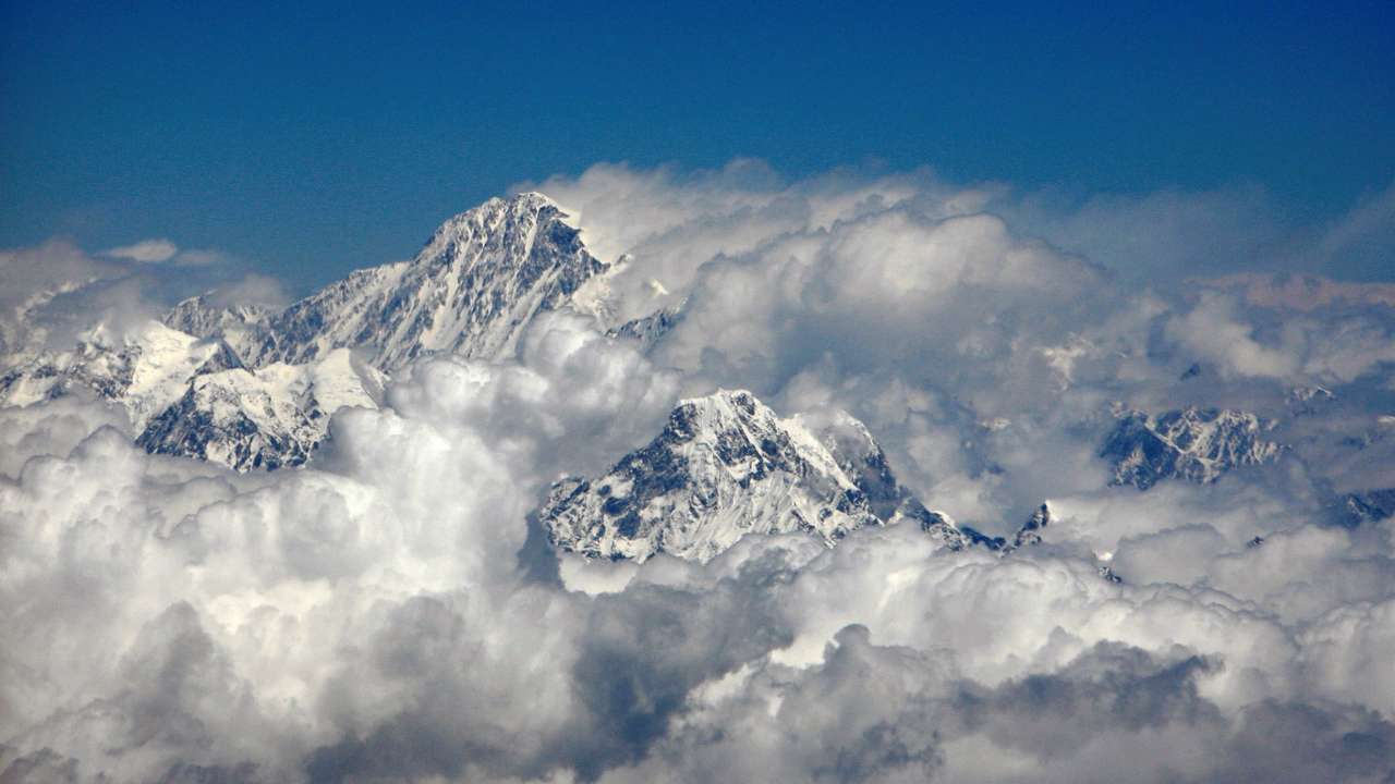 FILE PHOTO: Mount Everest (top), highest peak in the world, is seen in this aerial view