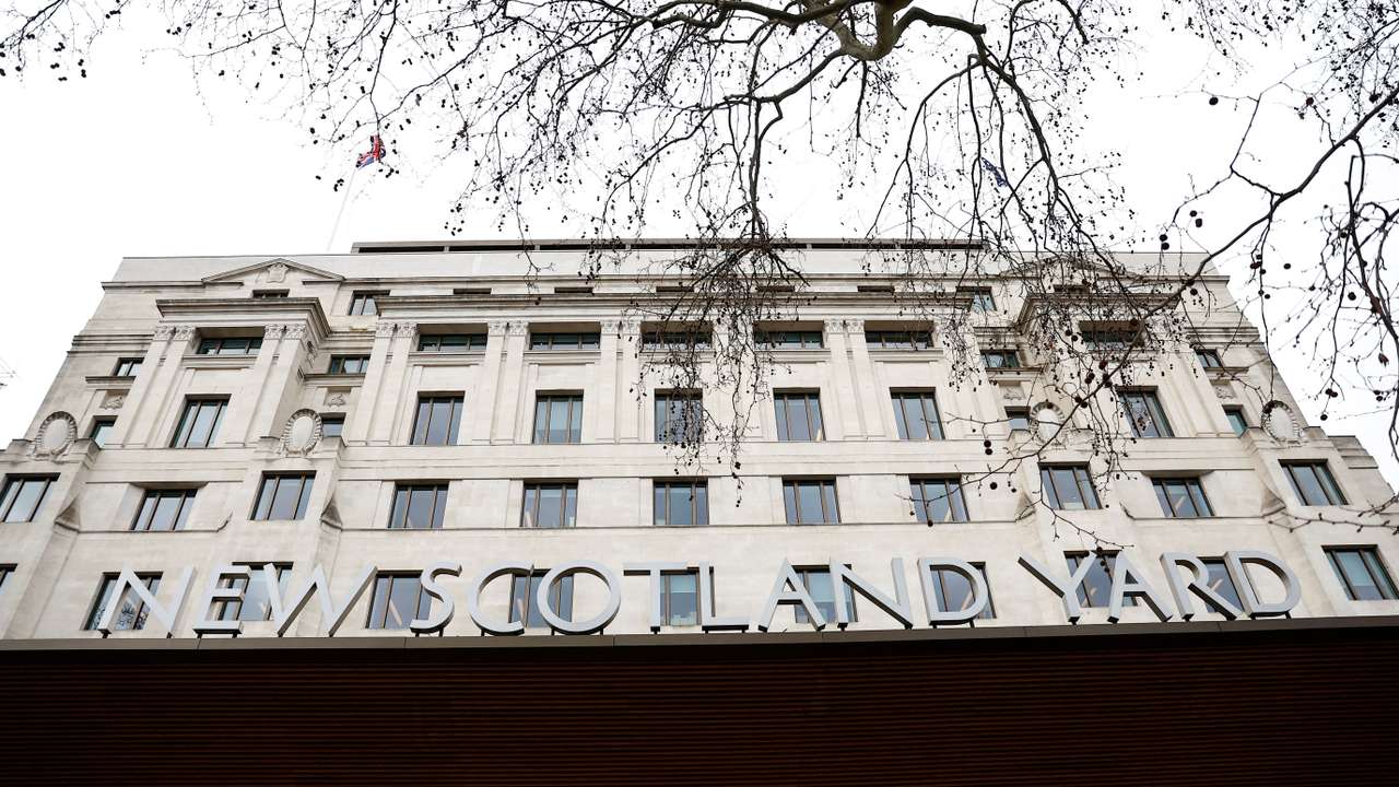 FILE PHOTO: A view of the New Scotland Yard sign outside the police headquarters, in London