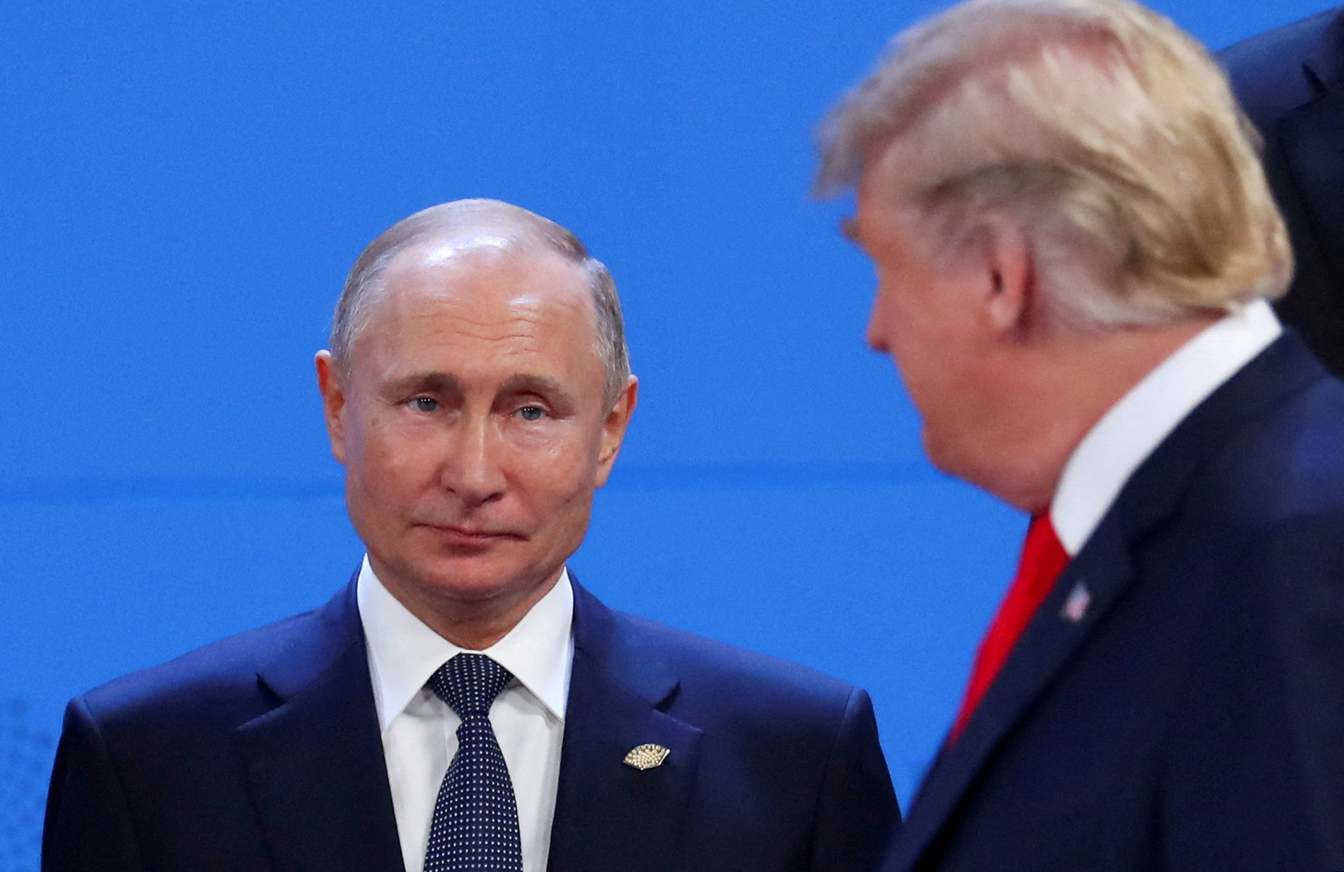 FILE PHOTO: Putin and Trump are pictured in 2018 in Argentina