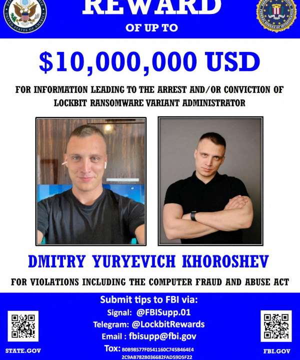 A wanted poster released by law enforcement shows a reward for an alleged member of the cybercrime gang LockBit, Dmitry Yuryevich Khroroshev