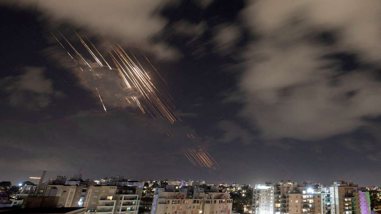 FILE PHOTO: Israel's Iron Dome anti-missile system intercepts rockets, as seen from Ashkelon