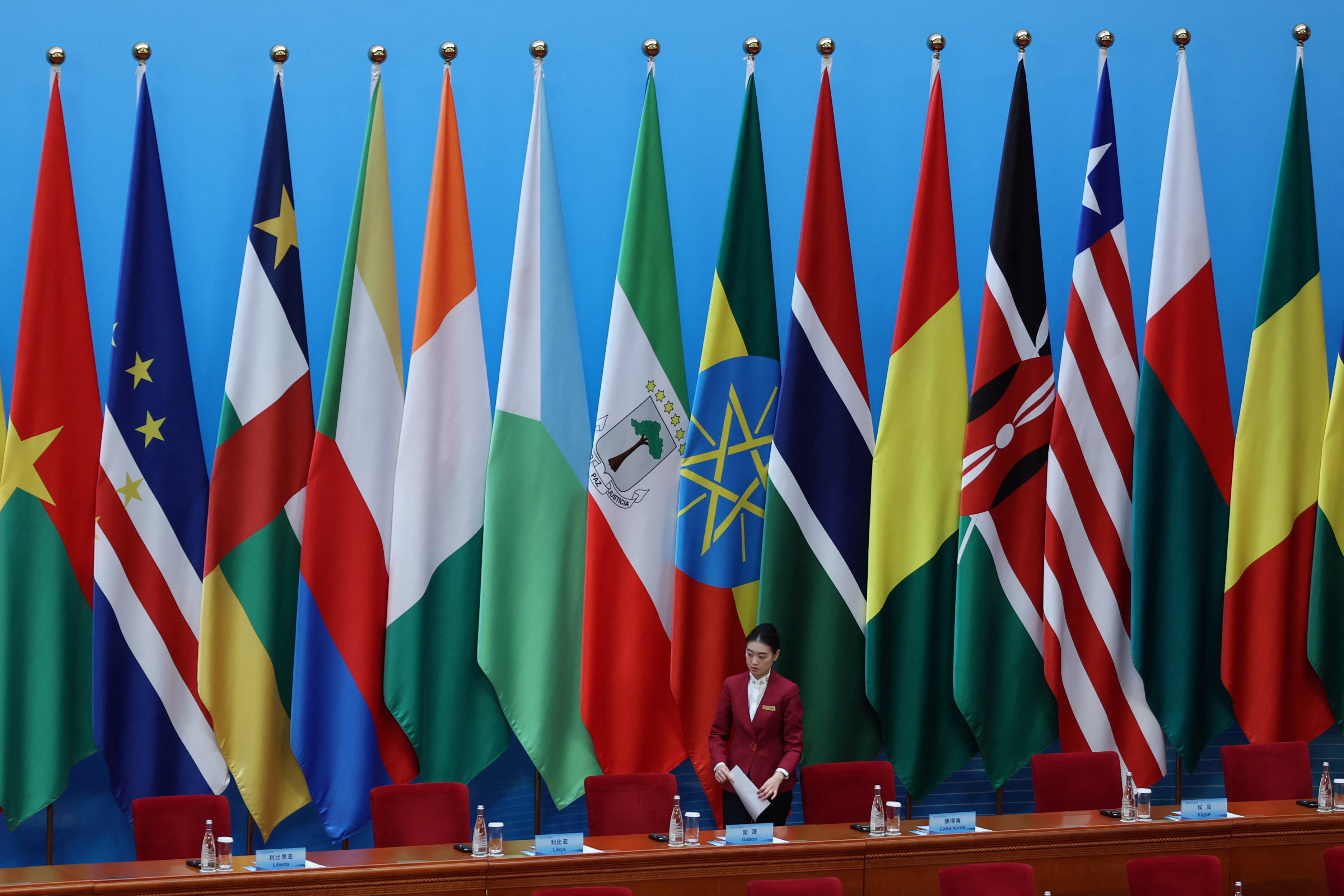 An attendant makes preparations ahead of the opening ceremony of the ninth Forum on China-Africa Cooperation (FOCAC) Summit, at the Great Hall of the People in Beijing, China September 5, 2024. REUTERS/Florence Lo