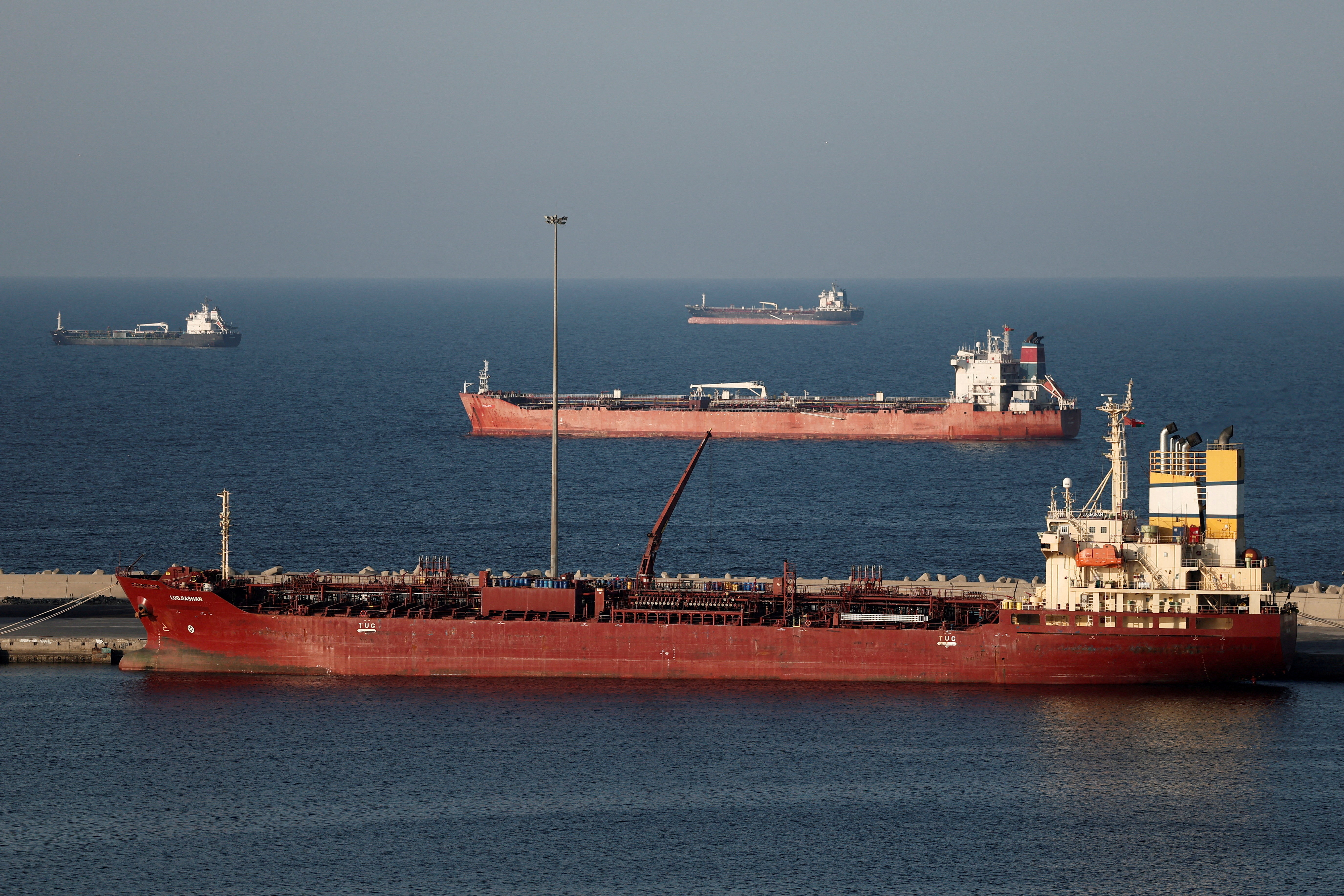 FILE PHOTO: Luojiashan tanker sits anchored in Muscat, as Iran vows to close the Strait of Hormuz, in Muscat