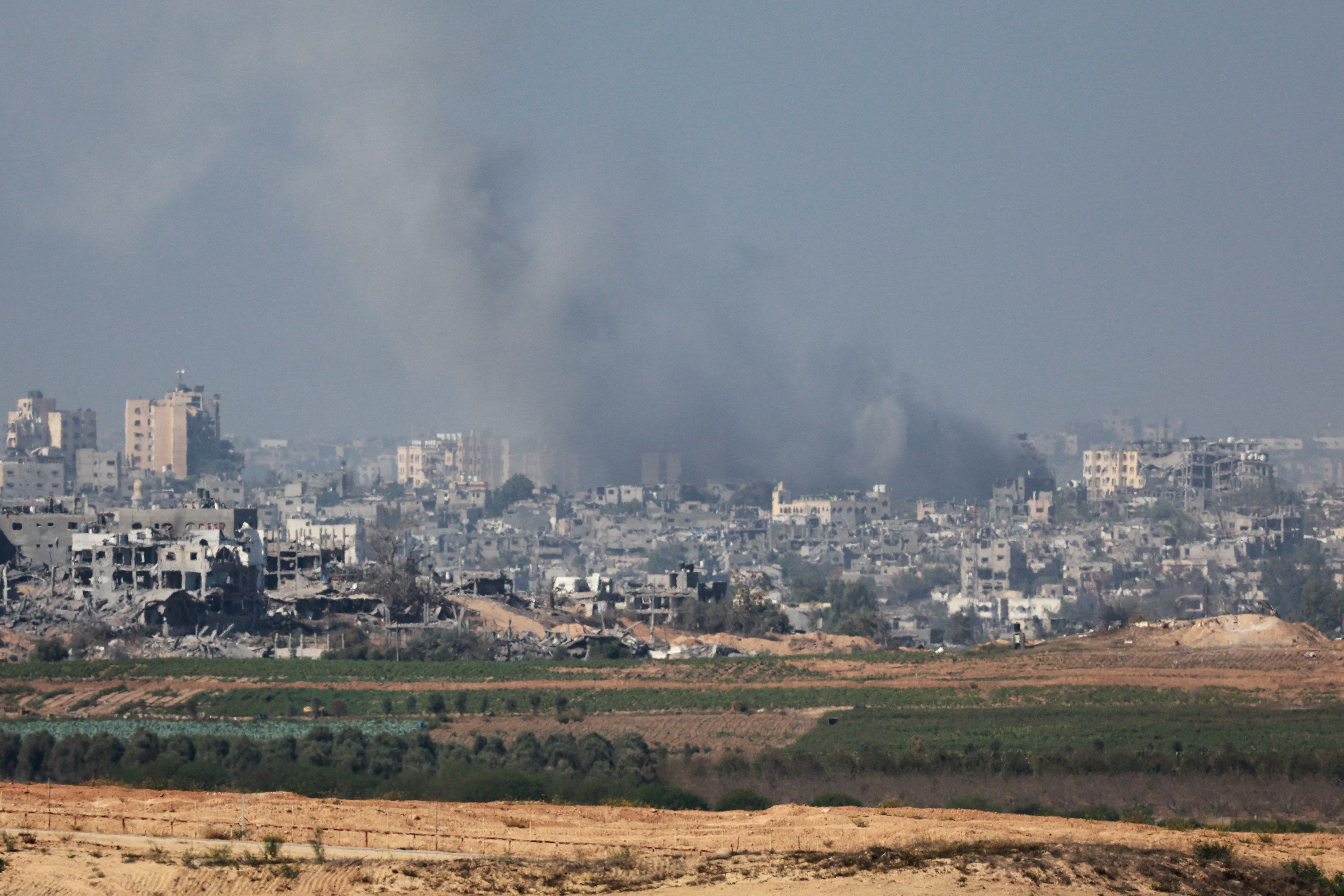 Smoke rises after an Israeli strike on Gaza  as seen from Sderot in southern Israel