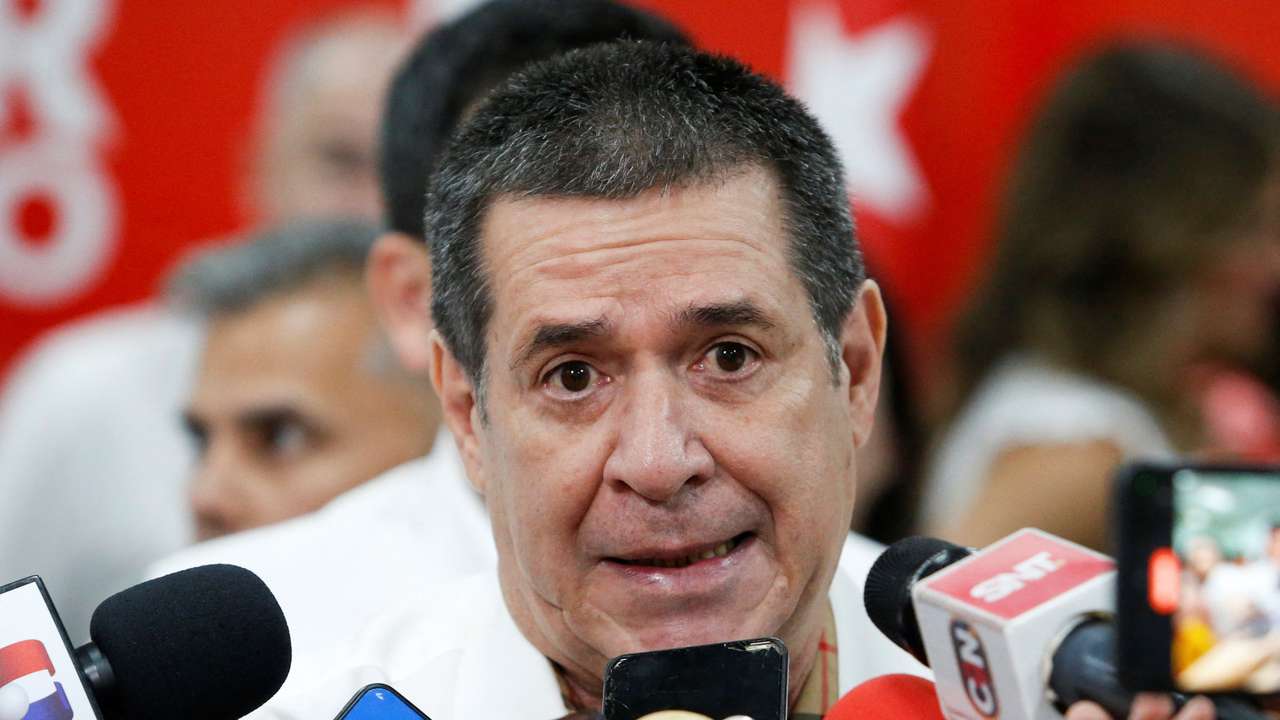 Presidential pre-candidates attend a primary election at a poll station, in Asuncion