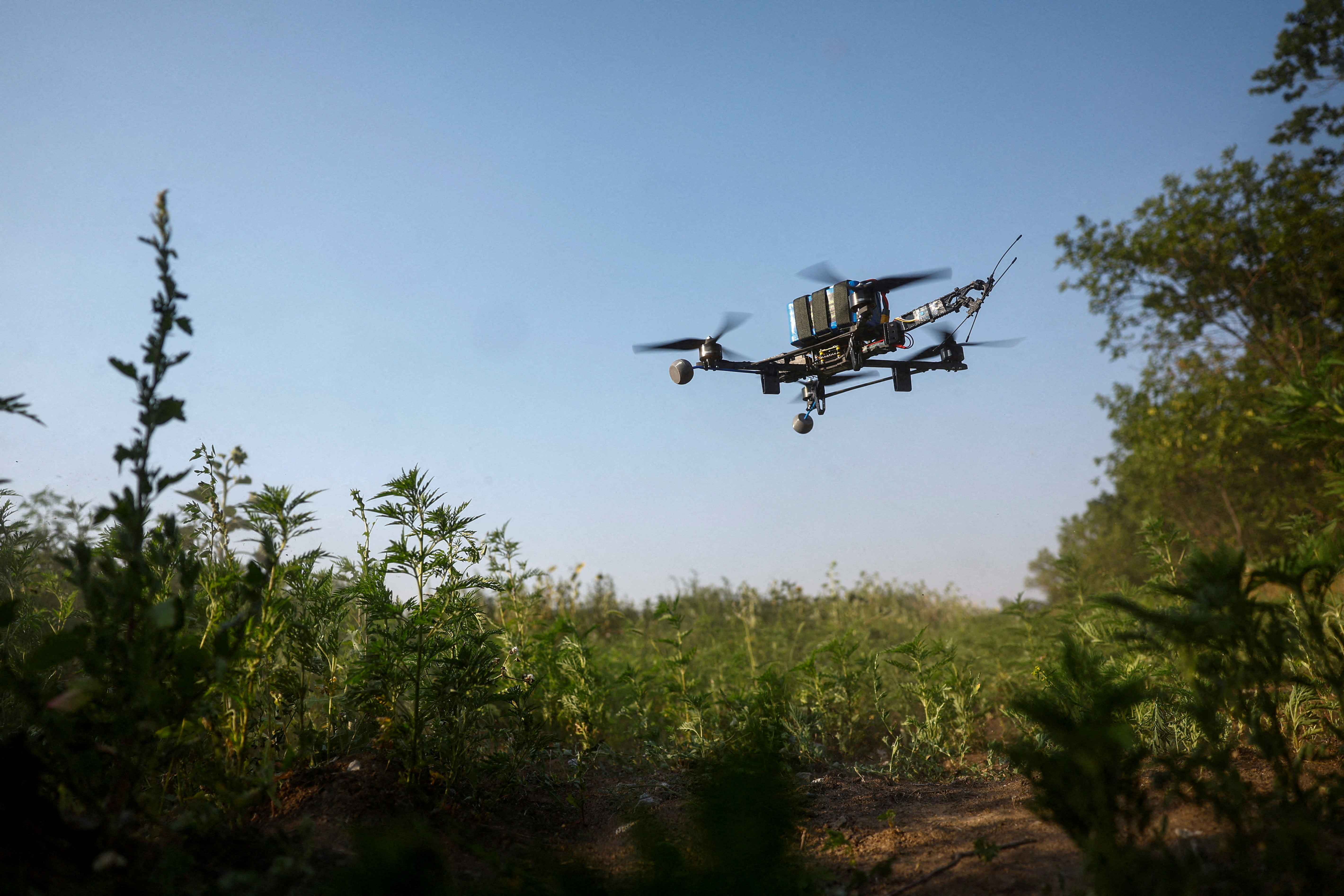 FILE PHOTO: View shows an interceptor FPV-drone during its flight, in an undisclosed location in Dnipropetrovsk region