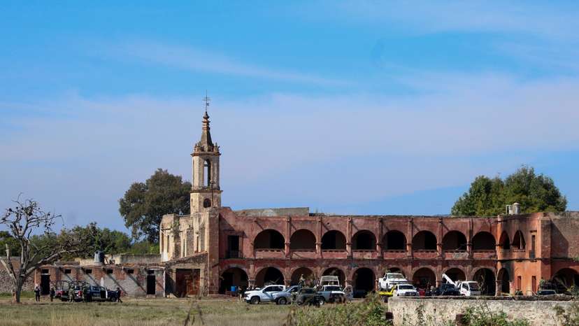 Authorities work at the scene of an attack at a posada, in Salvatierra
