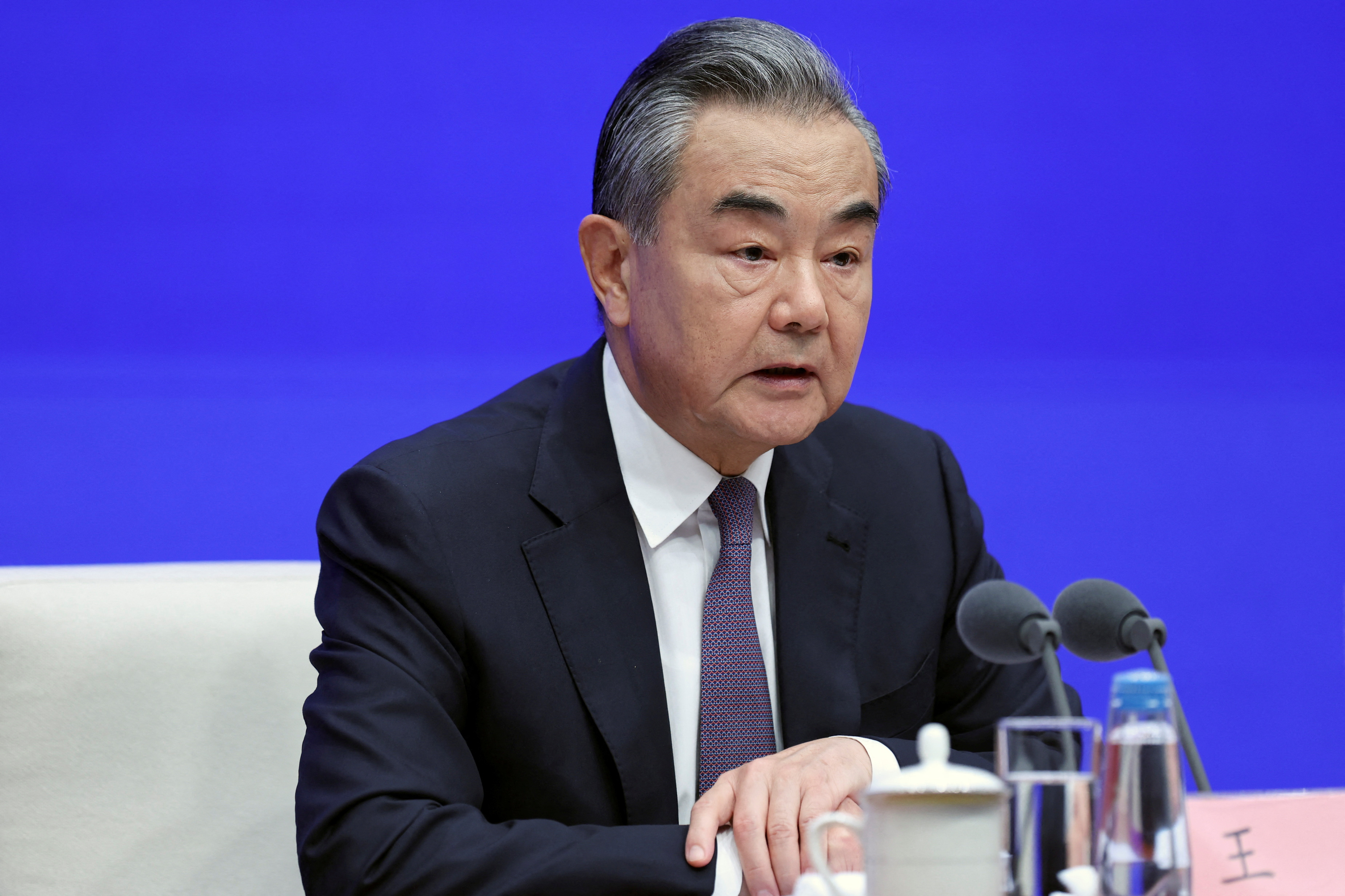 FILE PHOTO: Chinese Foreign Minister Wang Yi attends a press conference in Beijing