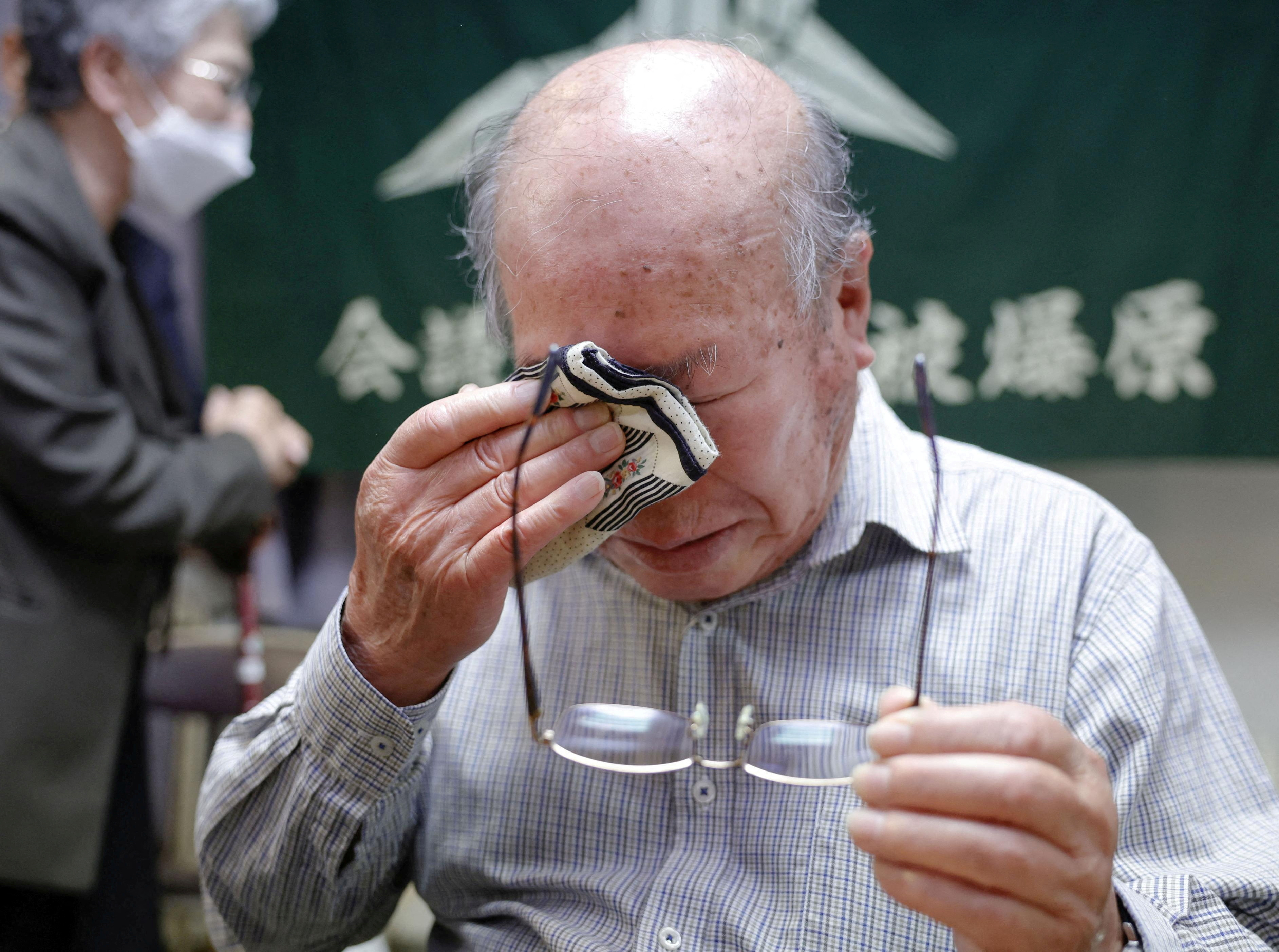 Shigemitsu Tanaka, a member of Japan Confederation of A- and H-Bomb Sufferers Organizations (Nihon Hidankyo), who survived the 1945 atomic bombing of Nagasaki, cries after the 2024 Nobel Peace Prize winner was announced in Nagasaki