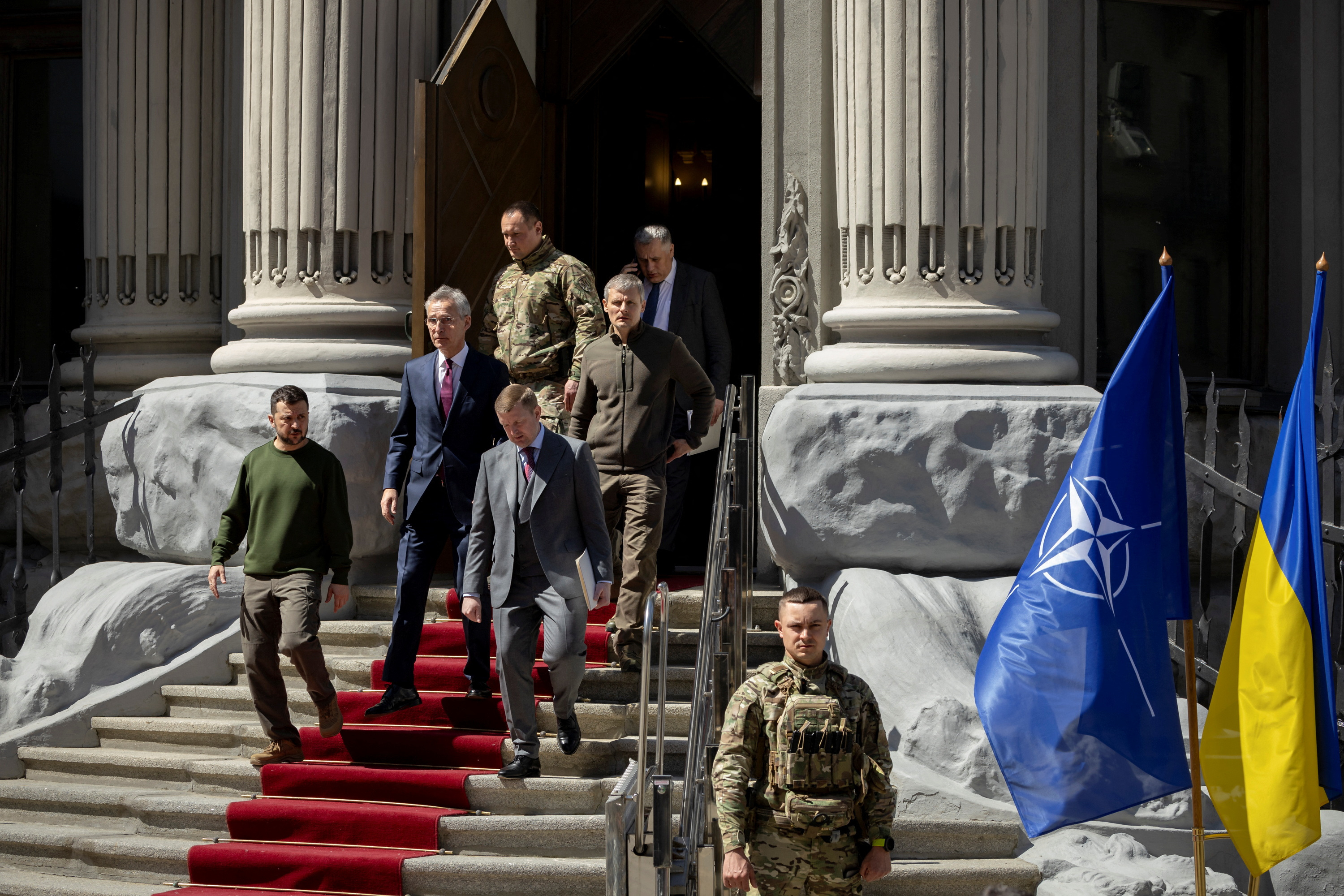Ukraine's President Volodymyr Zelenskiy and NATO Secretary-General Jens Stoltenberg arrive for a press conference in Kyiv
