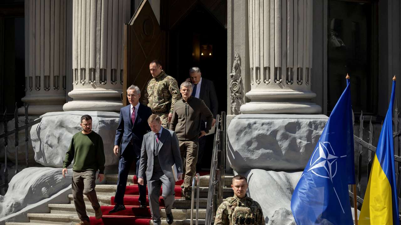 Ukraine's President Volodymyr Zelenskiy and NATO Secretary-General Jens Stoltenberg arrive for a press conference in Kyiv