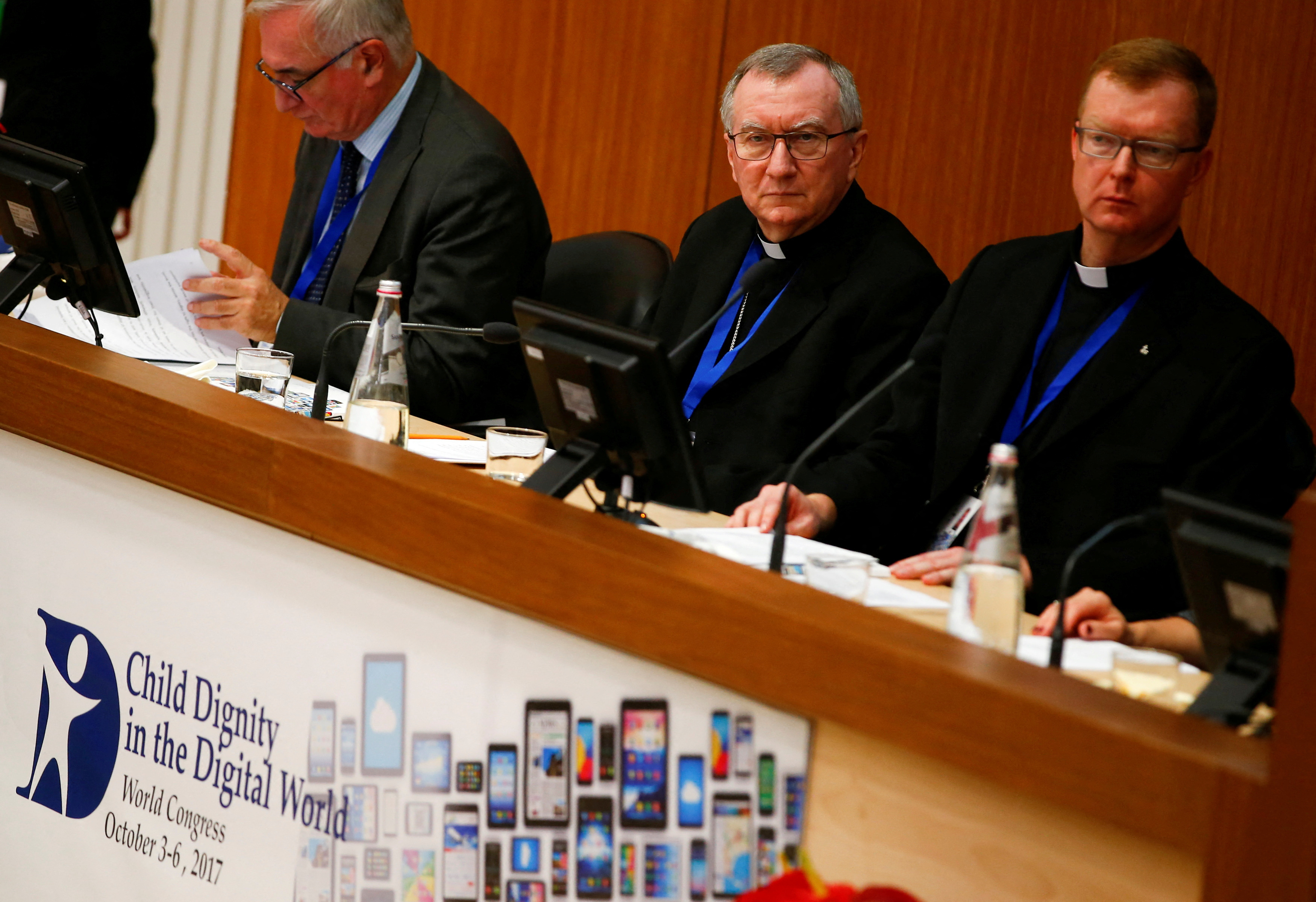 FILE PHOTO: Vatican Secretary of State Cardinal Pietro Parolin and father Hans Zollner, President of the Centre for Child Protection, attend the World Congress "Child Dignity in the Digital World" in Rome