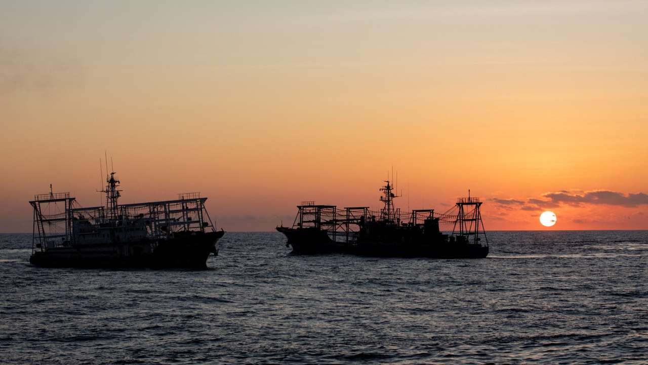 FILE PHOTO: Chinese Maritime Militia vessels are pictured near the Second Thomas Shoal in the South China Sea