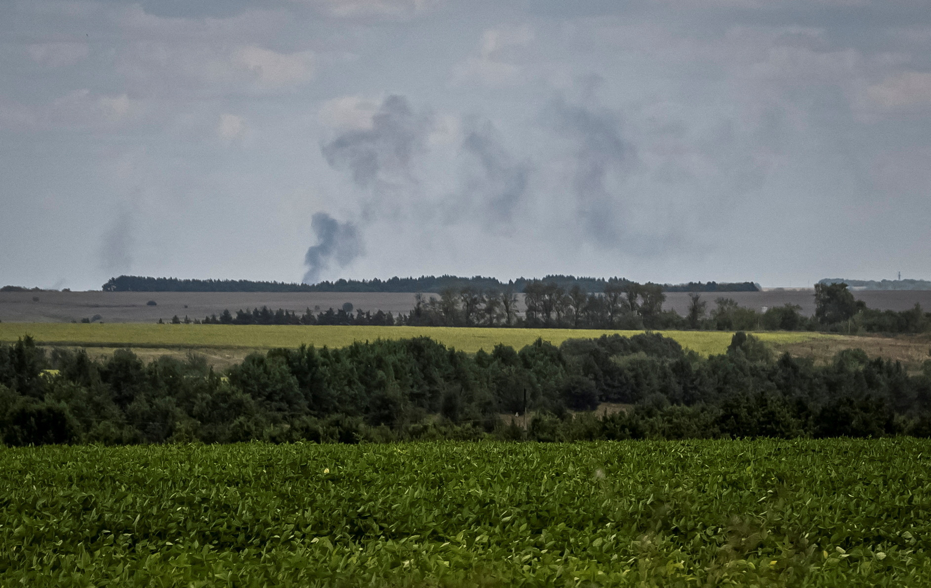 FILE PHOTO: Smoke rises after shelling at the Russian border in Sumy region