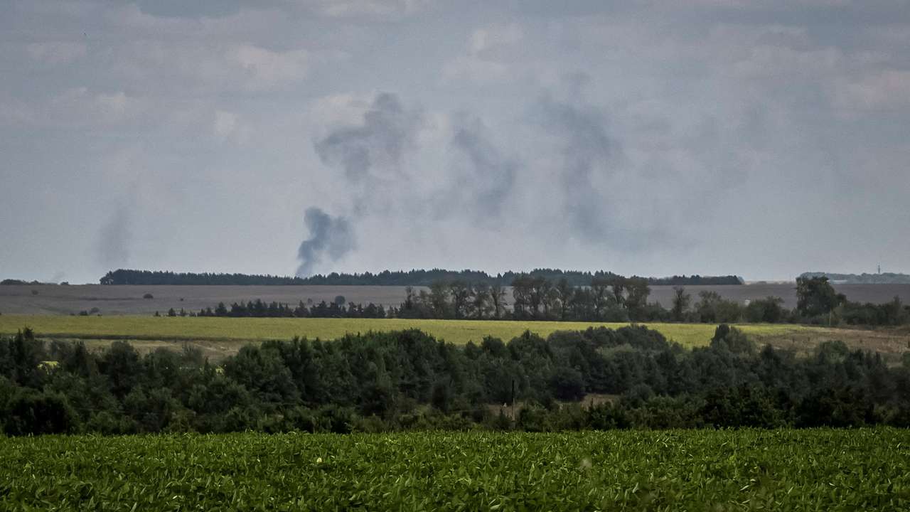 FILE PHOTO: Smoke rises after shelling at the Russian border in Sumy region