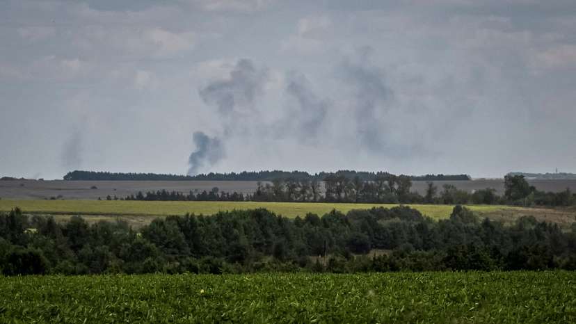 FILE PHOTO: Smoke rises after shelling at the Russian border in Sumy region