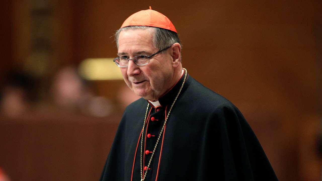 FILE PHOTO: Cardinal Mahony of the U.S. arrives for a prayer at Saint Peter's Basilica in the Vatican