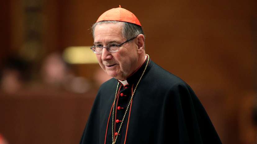 FILE PHOTO: Cardinal Mahony of the U.S. arrives for a prayer at Saint Peter's Basilica in the Vatican