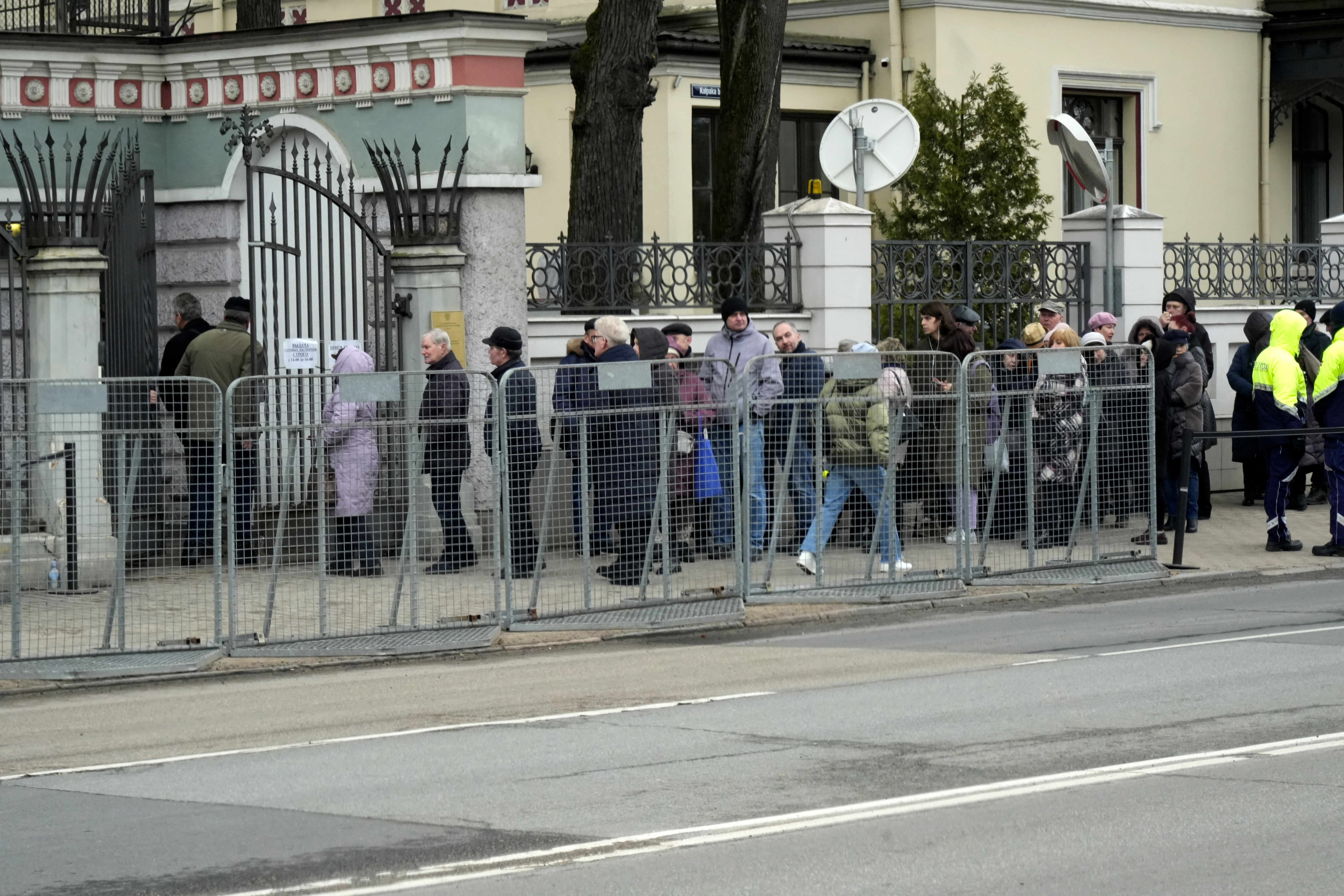 People vote during Russian election in Riga