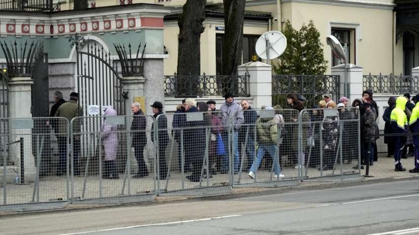 People vote during Russian election in Riga