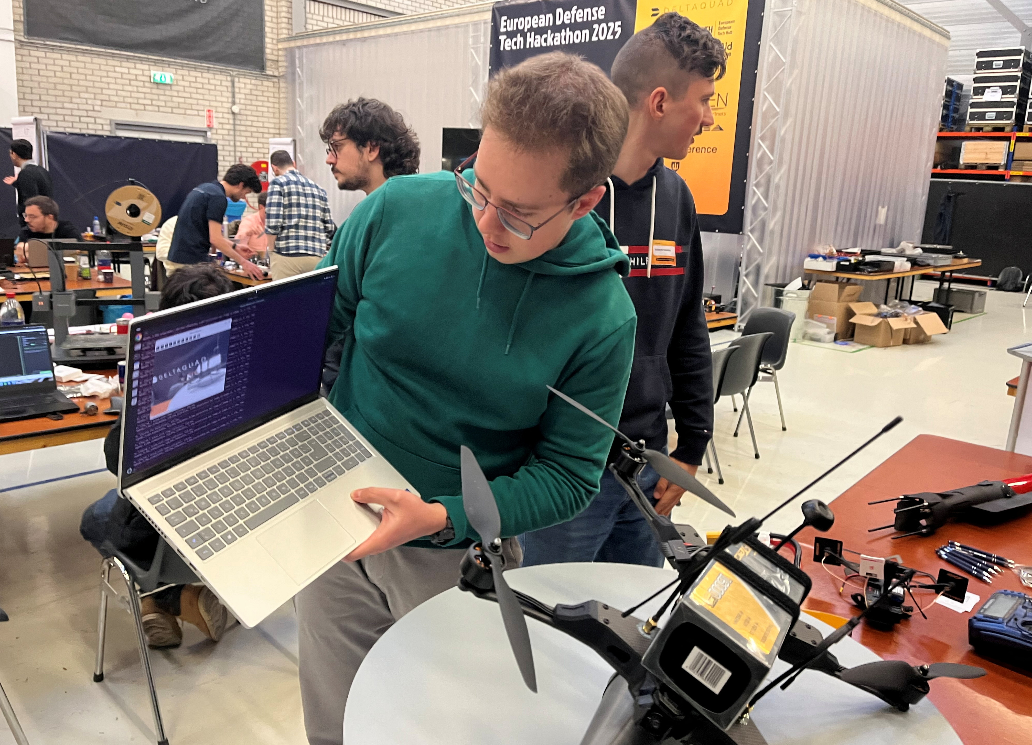 People take part in the European Defense Tech Hub hackathon at DeltaQuad headquarters in Amsterdam