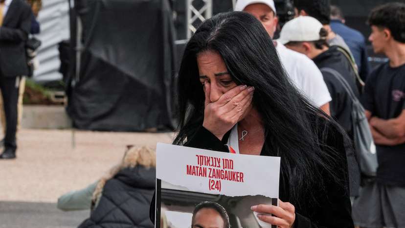 Family members and supporters of hostages deliver statements for the release of hostages who were kidnapped during the deadly October 7, 2023 attack by Hamas, in Tel Aviv
