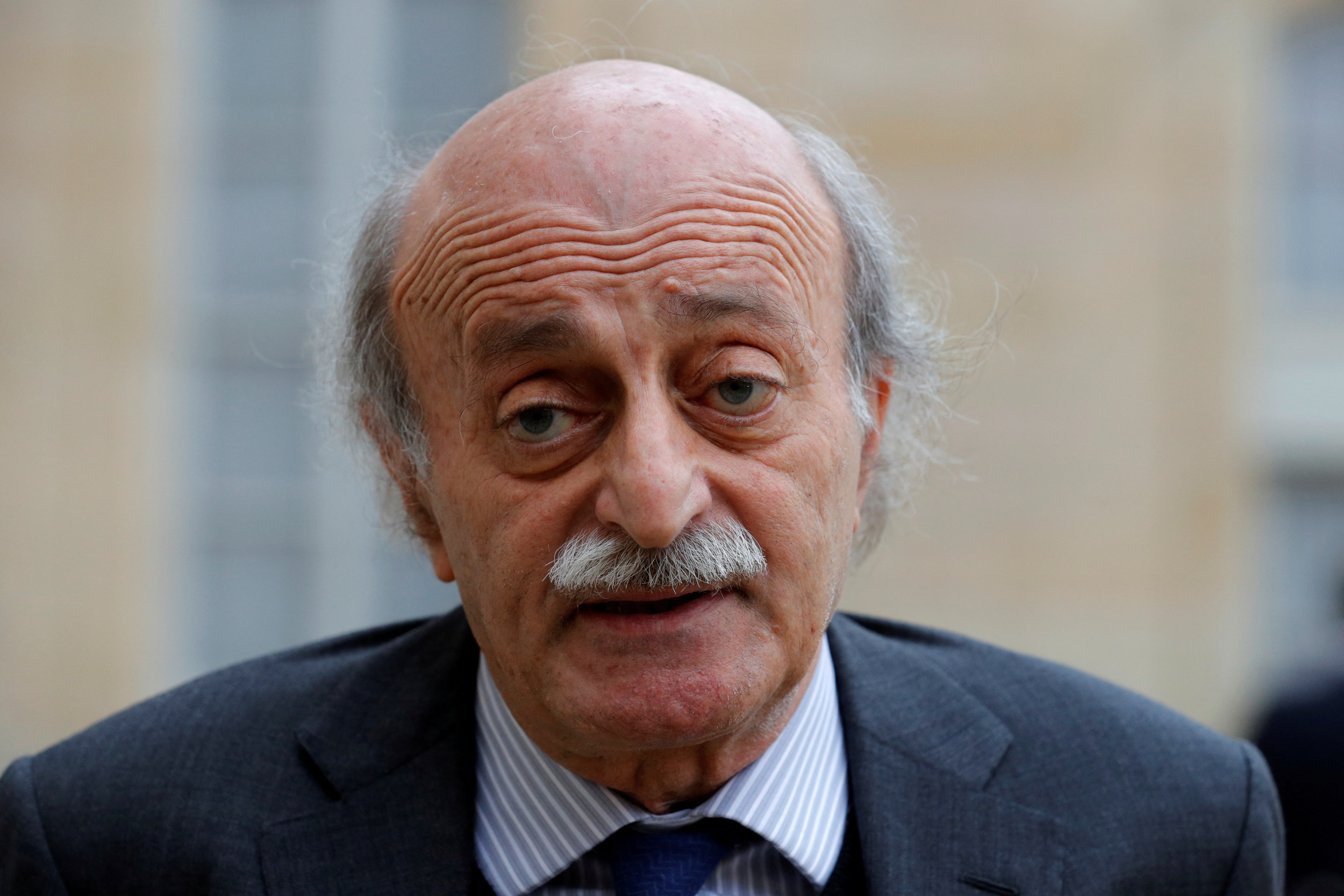 FILE PHOTO: Lebanese Druze leader Walid Jumblatt leaves the Elysee Palace in Paris following a meeting with French President Francois Hollande