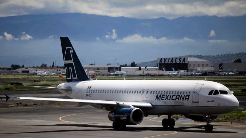 A Mexicana Airlines Airbus A320 passenger jet is seen at the Benito Juarez international airport in Mexico City