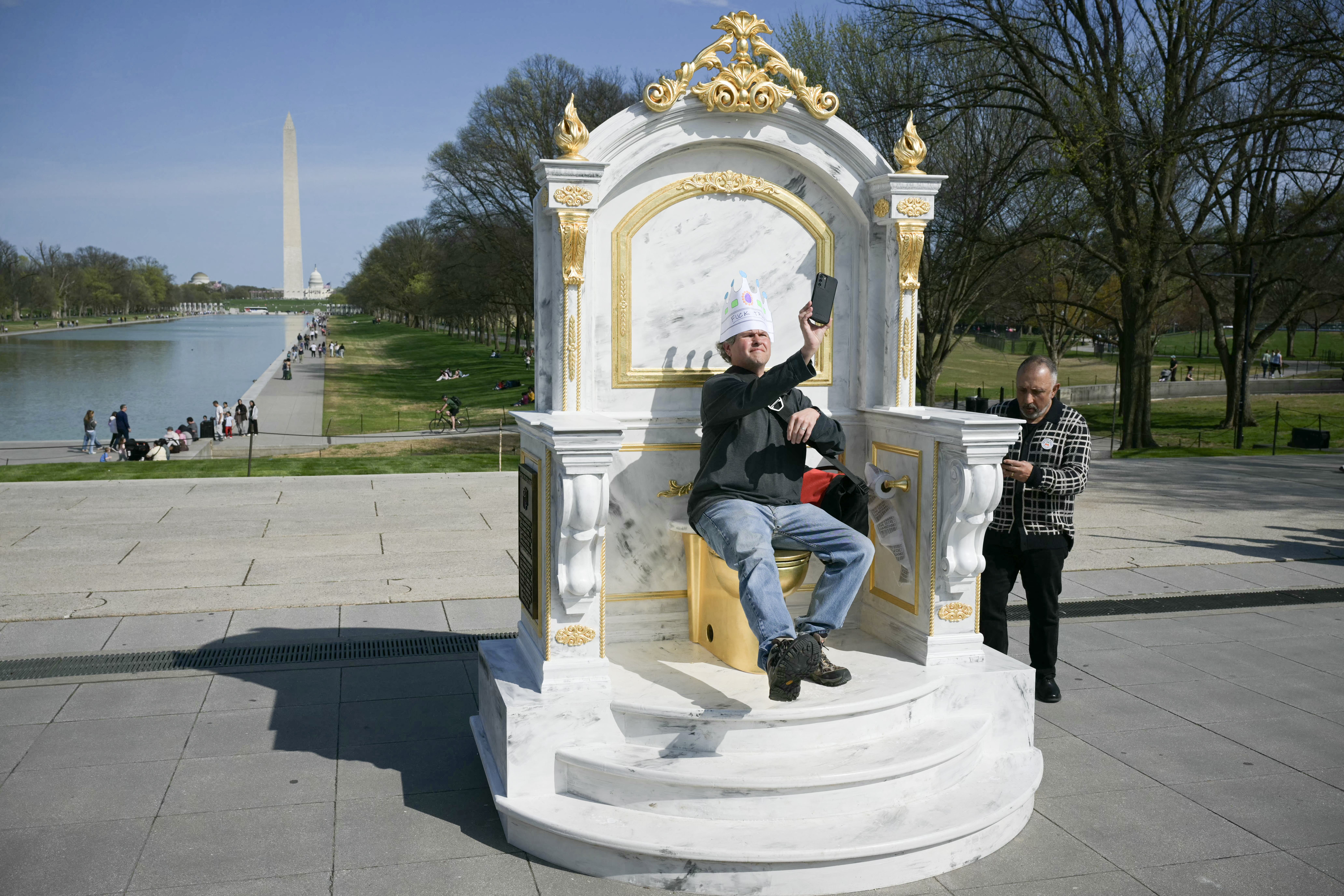 ‘Golden toilet’ art installation mocks Trump
