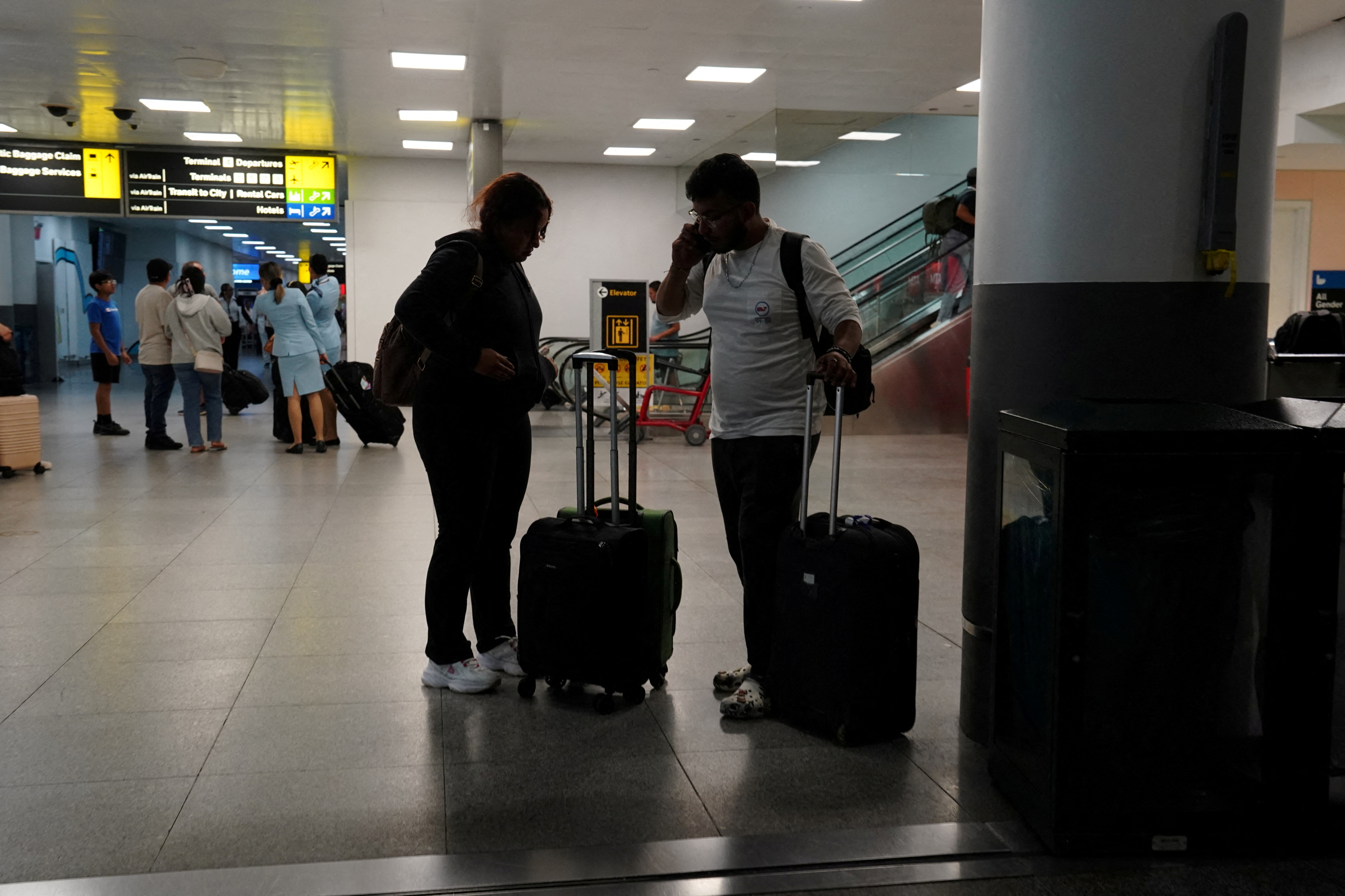 FILE PHOTO: Trump reinstates U.S. travel ban, bars citizens of 12 countries