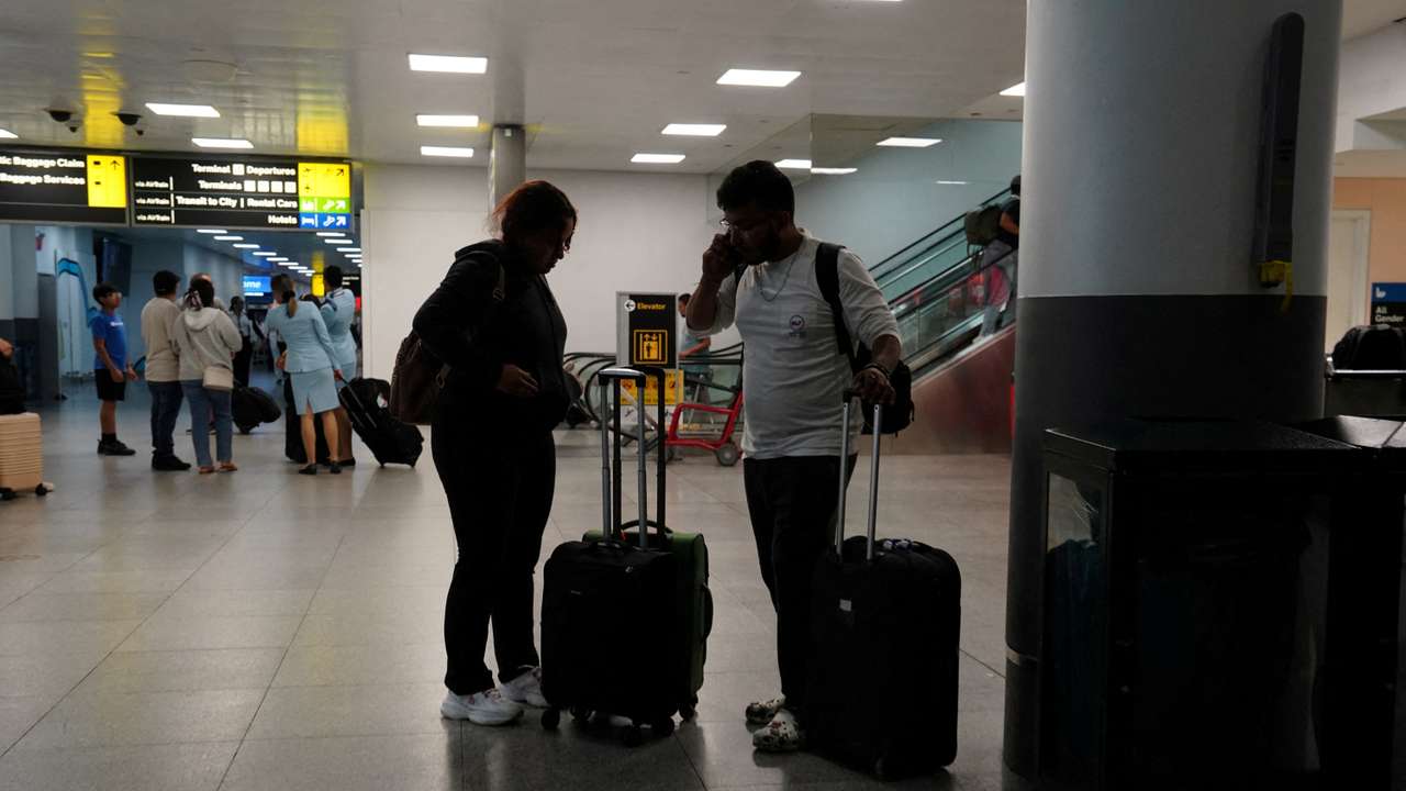 FILE PHOTO: Trump reinstates U.S. travel ban, bars citizens of 12 countries