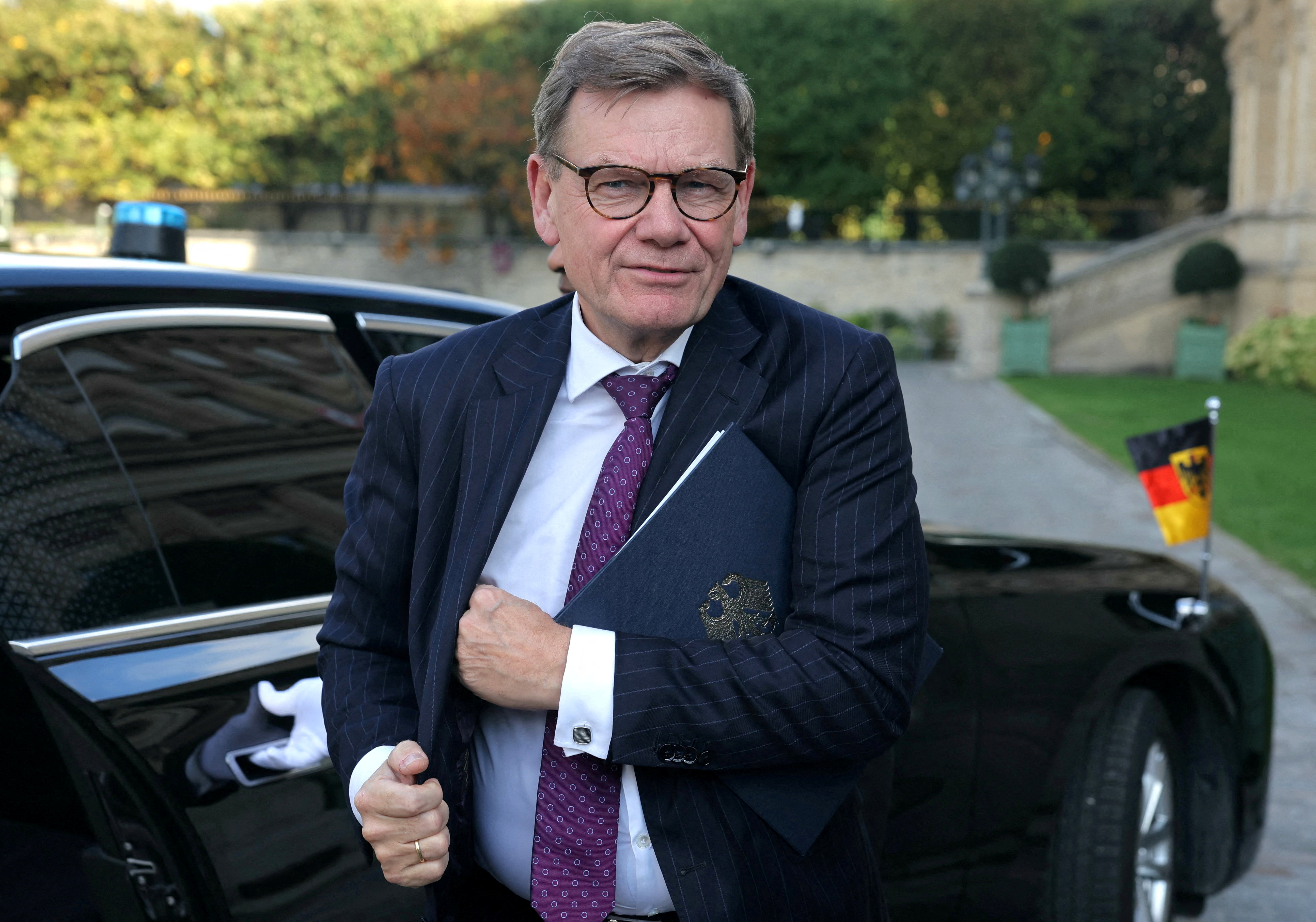 FILE PHOTO: German Foreign Minister Johann Wadephul arrives for a meeting on implementation of a Middle East peace plan at the Quai d'Orsay, in Paris