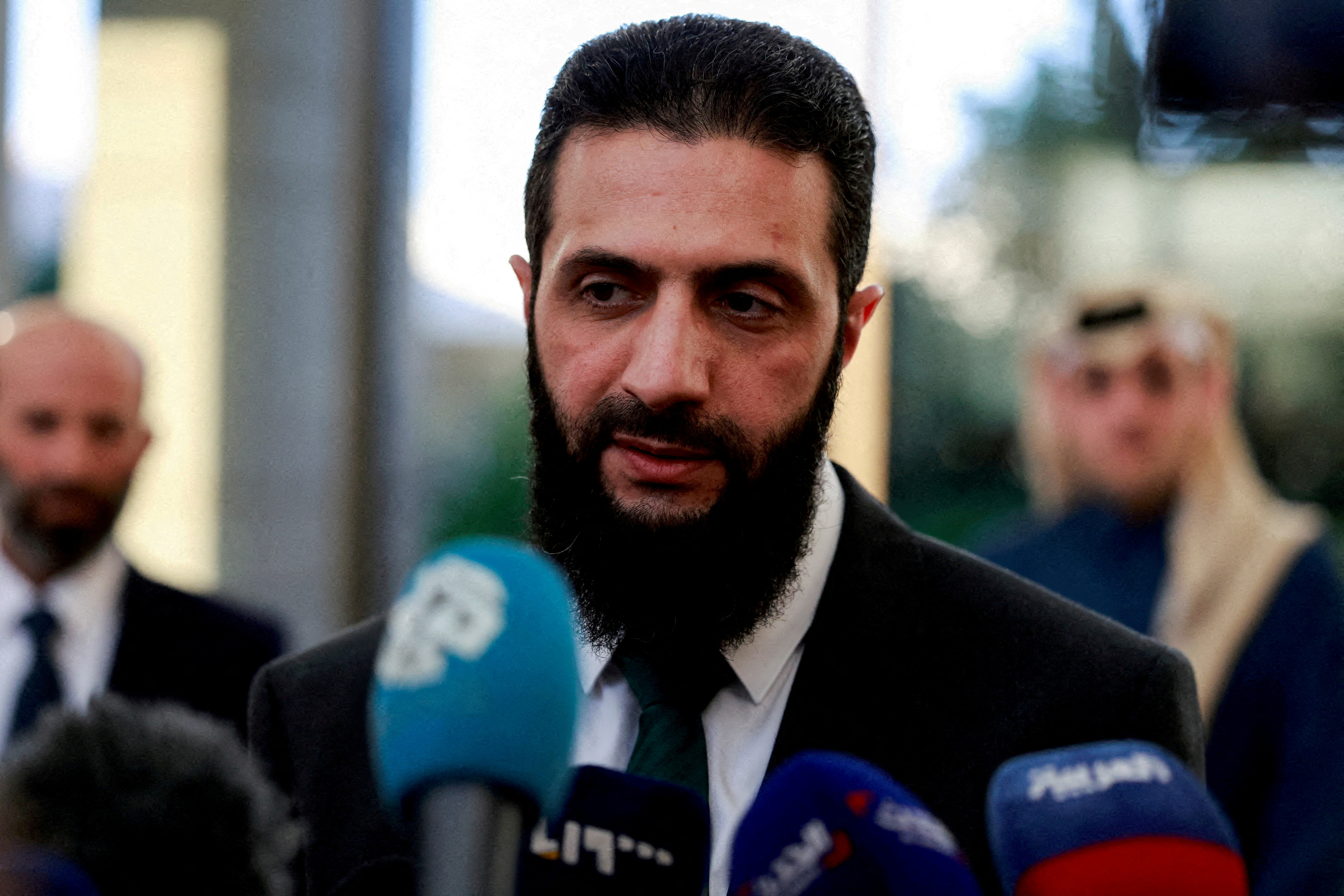 FILE PHOTO: Ahmed al-Sharaa speaks to the media in Damascus