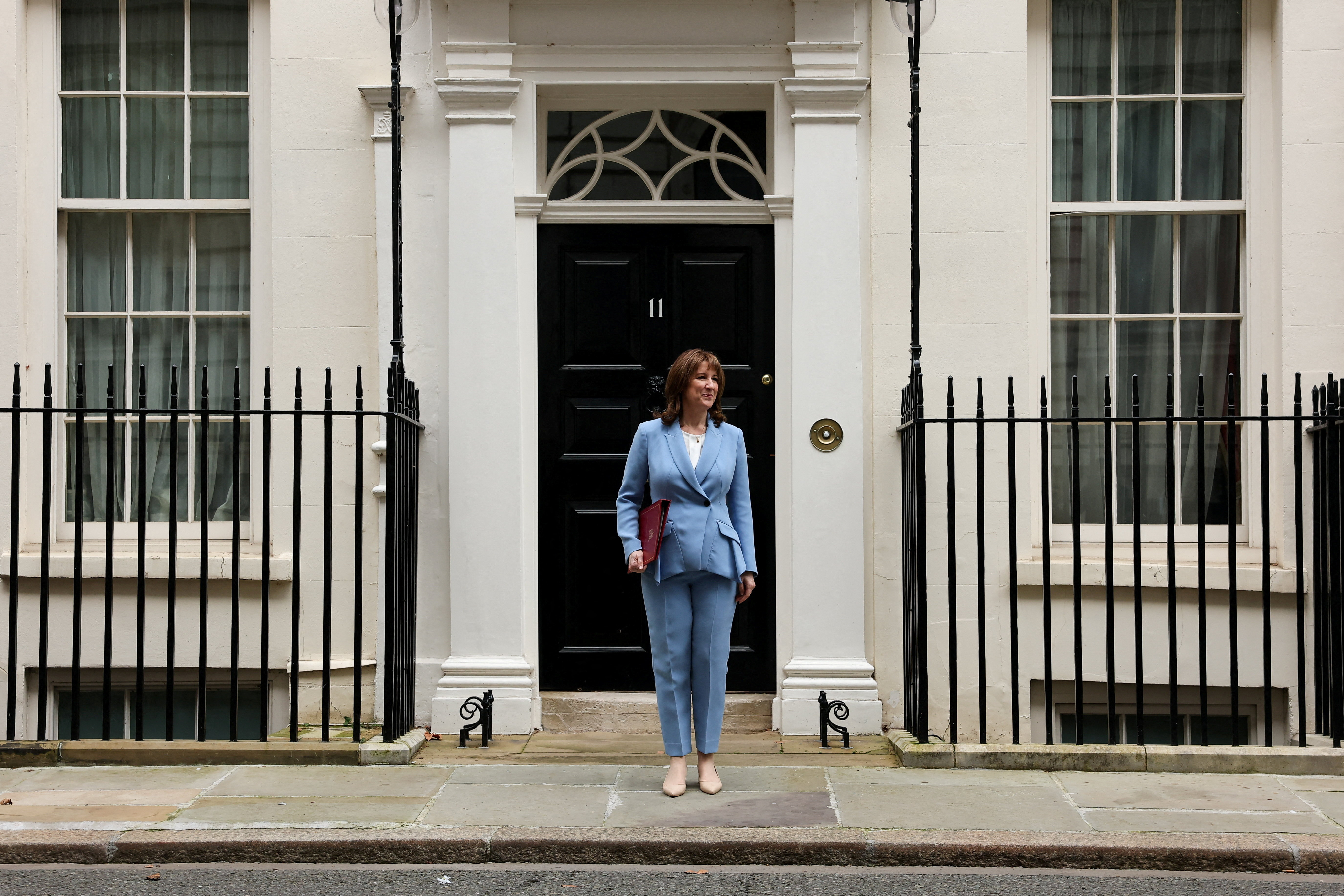 British Chancellor of the Exchequer Reeves outside 11 Downing Street ahead of presenting the Spring Forecast to Parliament, in London