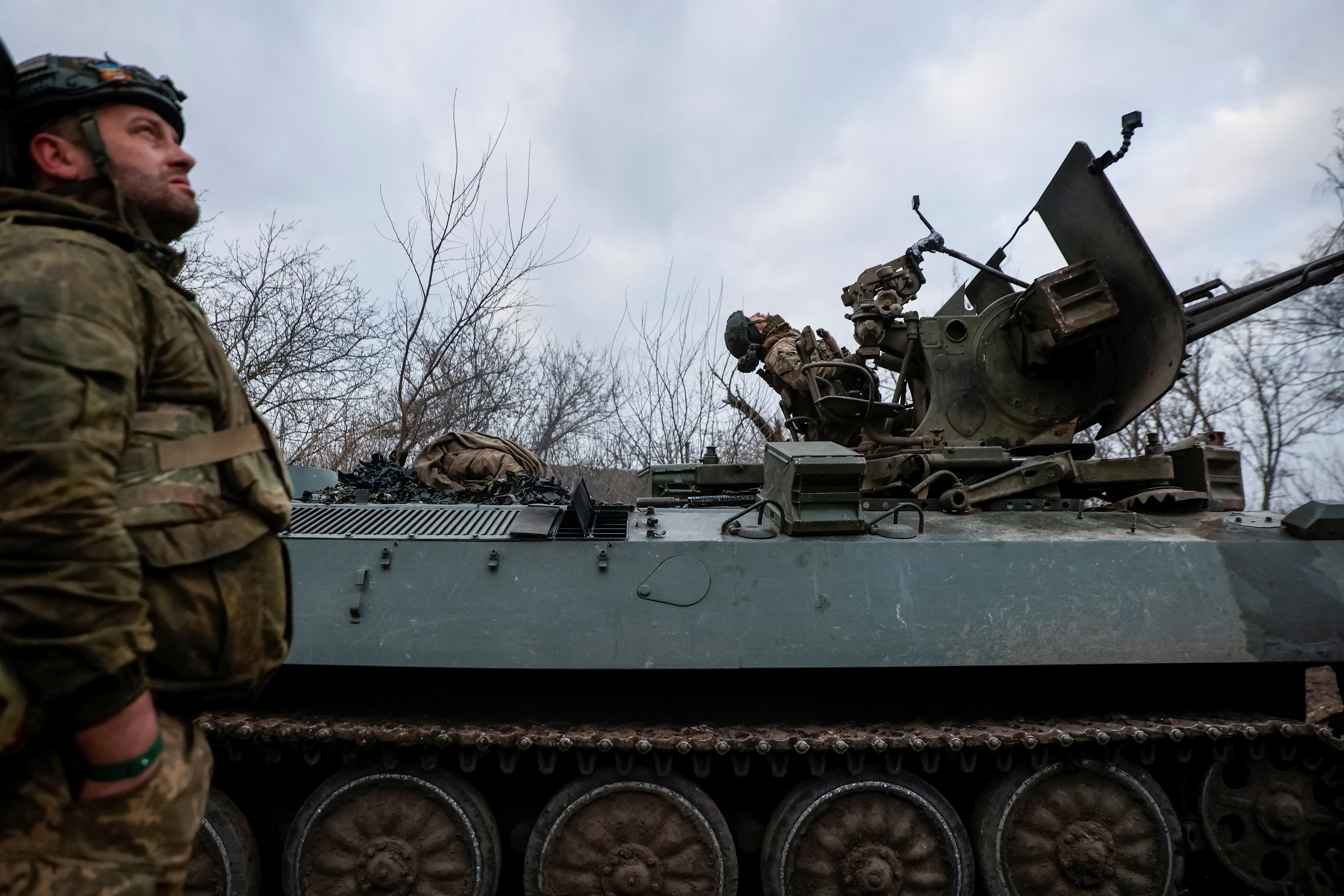FILE PHOTO: Ukrainian servicemen from air defence unit monitor a sky at a frontline near the town of Bakhmut