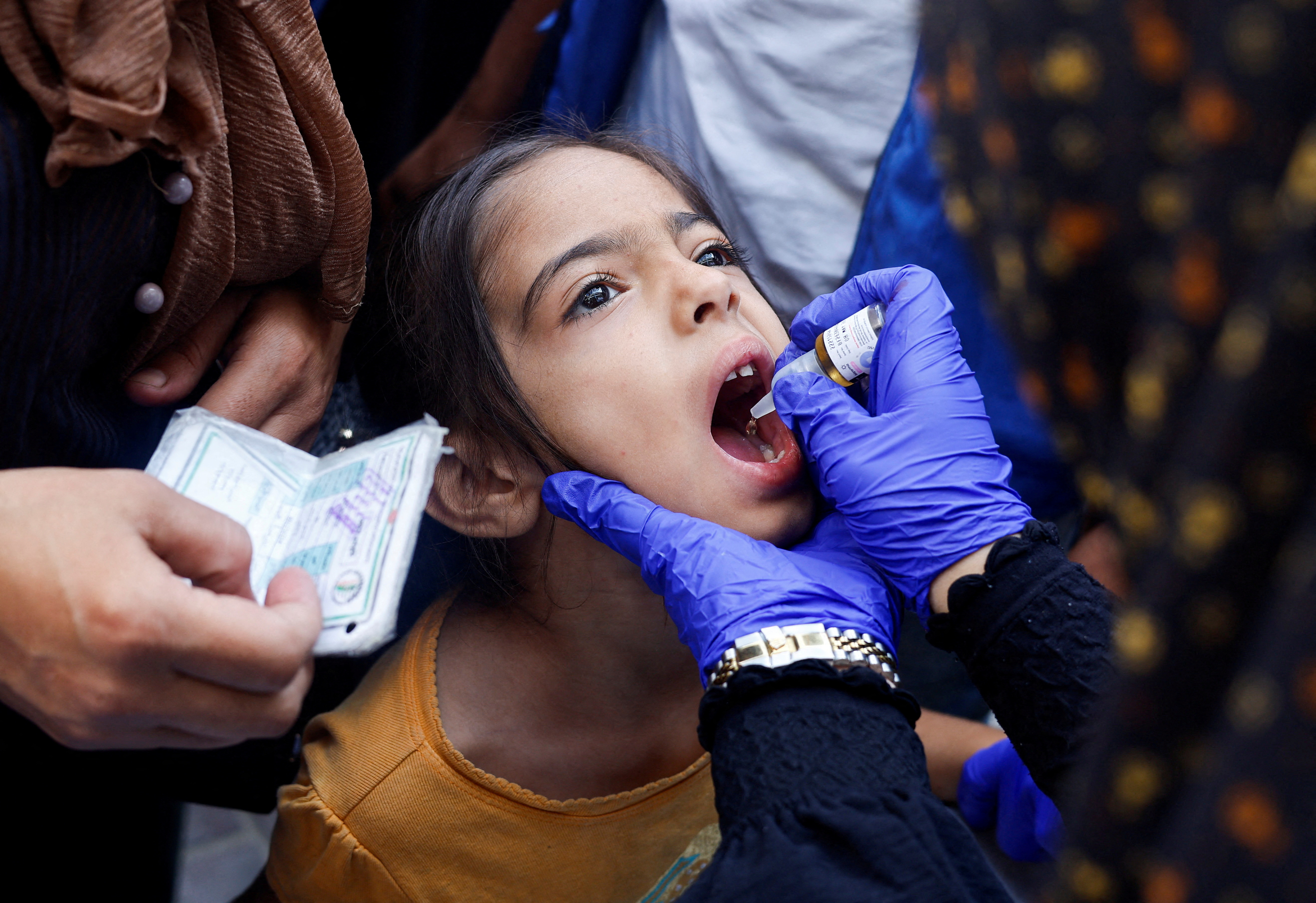Palestinian children are vaccinated against polio, in Khan Younis in the southern Gaza Strip