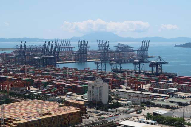 FILE PHOTO: Cranes and containers are seen at the Yantian port in Shenzhen, following the novel coronavirus disease (COVID-19) outbreak
